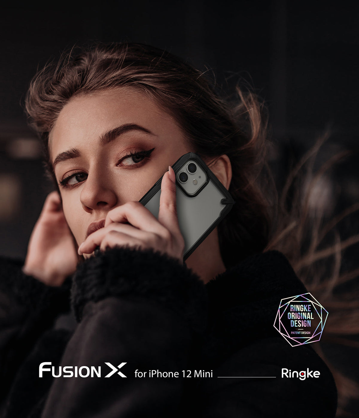 iPhone 12 Mini Case | Fusion-X - Woman holding a black Fusion-X protective case on an iPhone 12 Mini against her ear.
