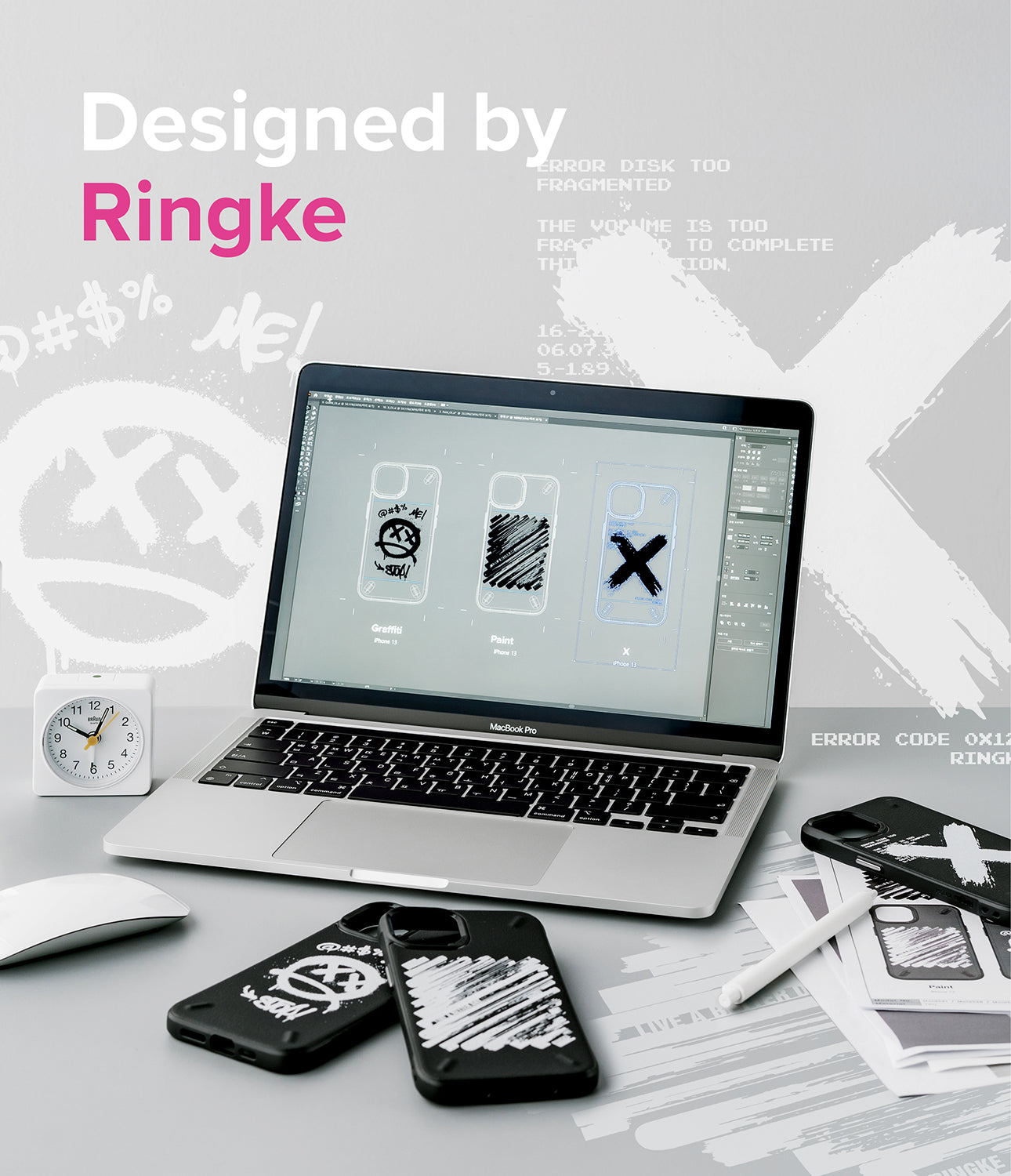 iPhone 13 Case | Onyx Design - Laptop displaying phone case designs with physical cases on a desk with a clock and stylus.