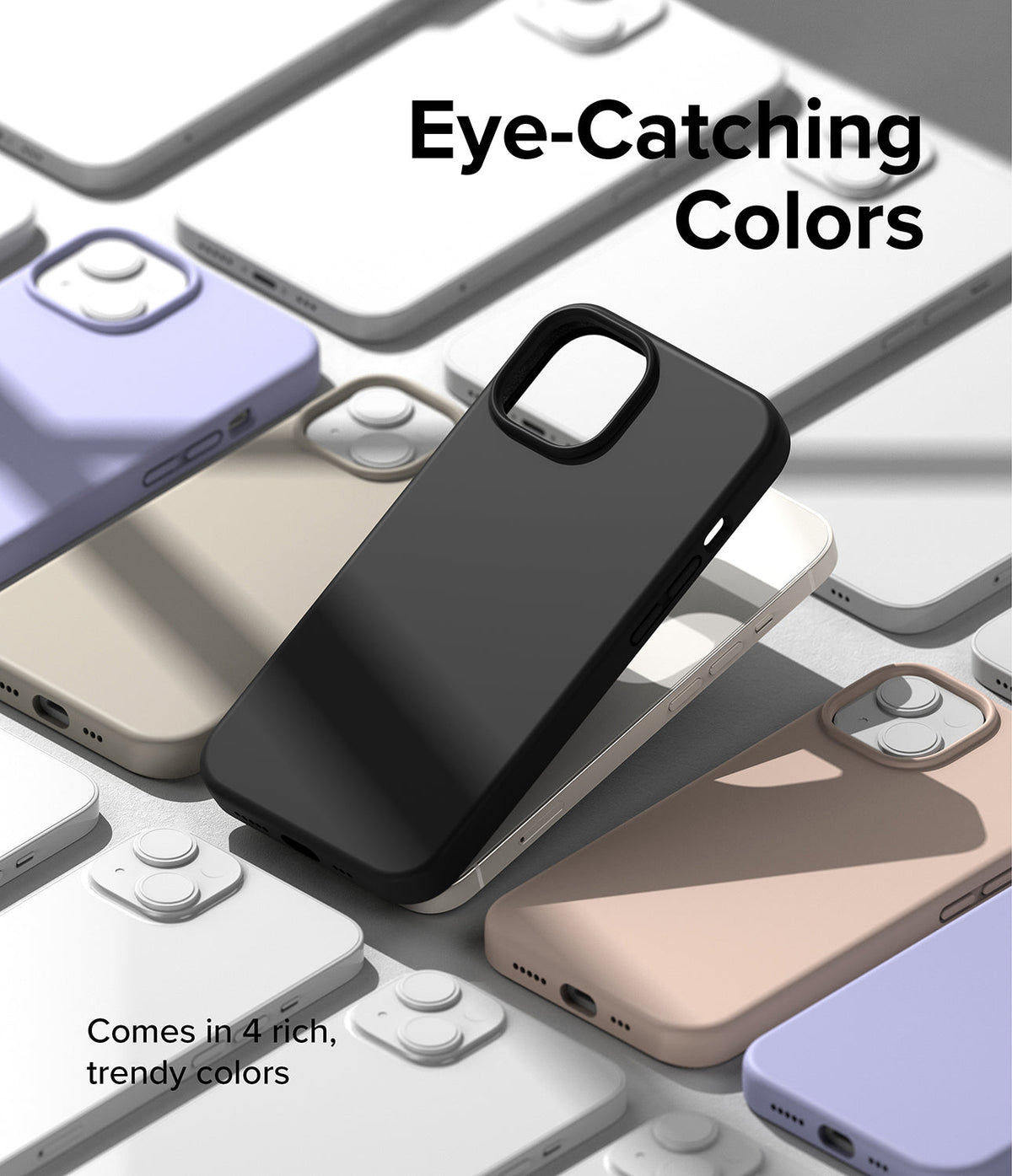 iPhone 14 Plus Case | Silicone - A black silicone phone case surrounded by other cases in pastel colors on a gray surface.