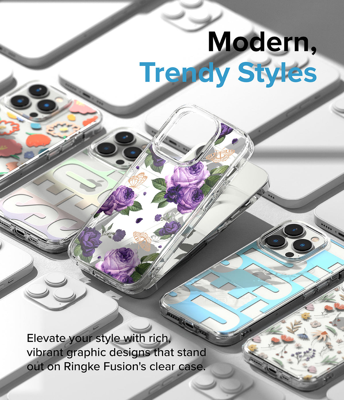 iPhone 14 Pro Max Case | Fusion Design - Multiple clear iPhone cases with floral and graphic designs arranged on a white surface.