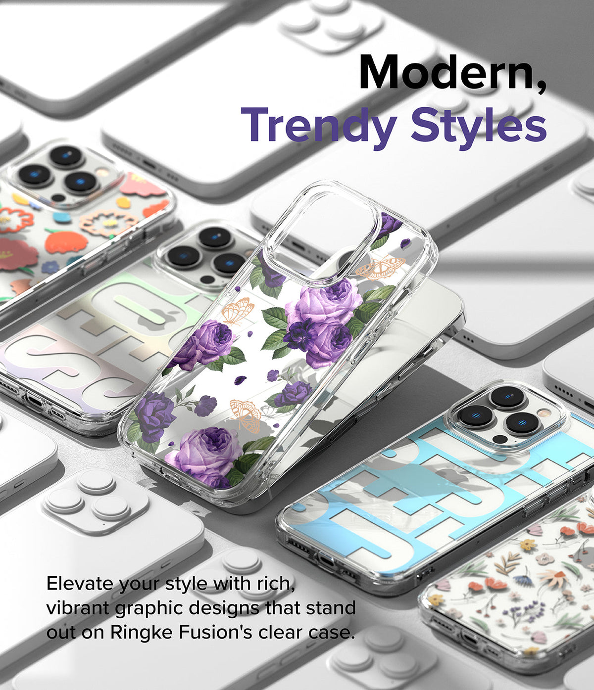 iPhone 14 Pro Max Case | Fusion Design - Clear phone cases with floral and graphic patterns arranged on a gray surface.