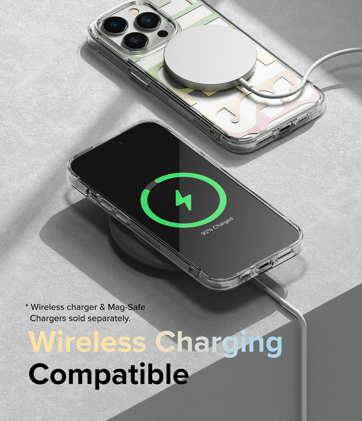 iPhone 14 Pro Case | Fusion Design - Clear phone case with MagSafe charger and wireless charging icon on screen.