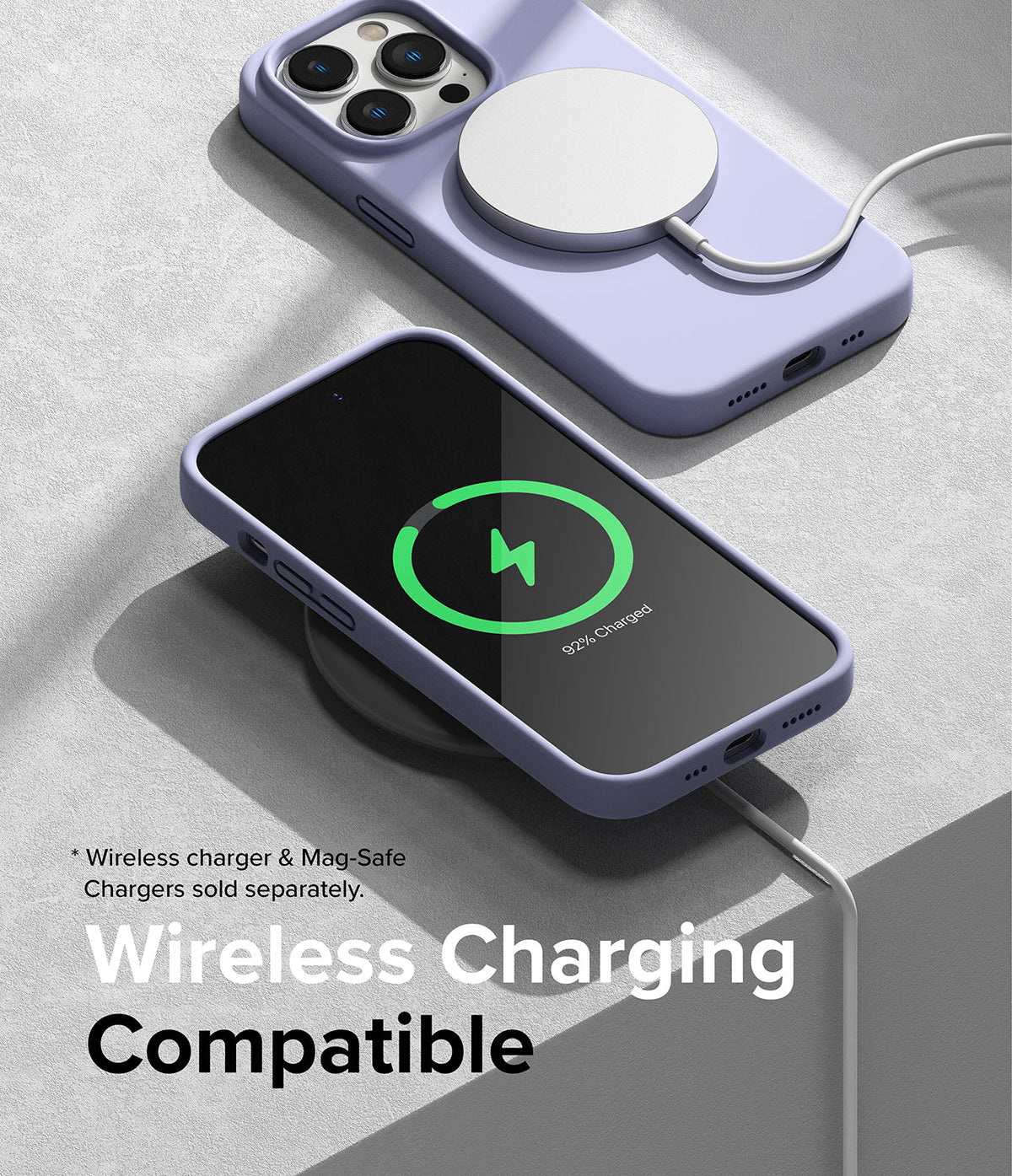 iPhone 14 Pro Max Case | Silicone - Lavender silicone iPhone cases on wireless chargers showing charging status.