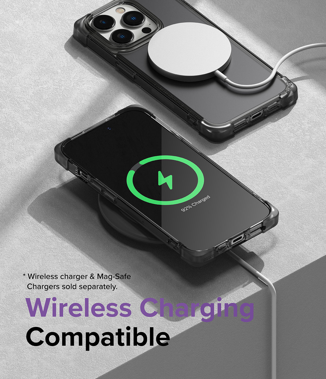 iPhone 14 Pro Case | Fusion Bumper - Two iPhones in clear bumper cases charging wirelessly with MagSafe and a charging pad.
