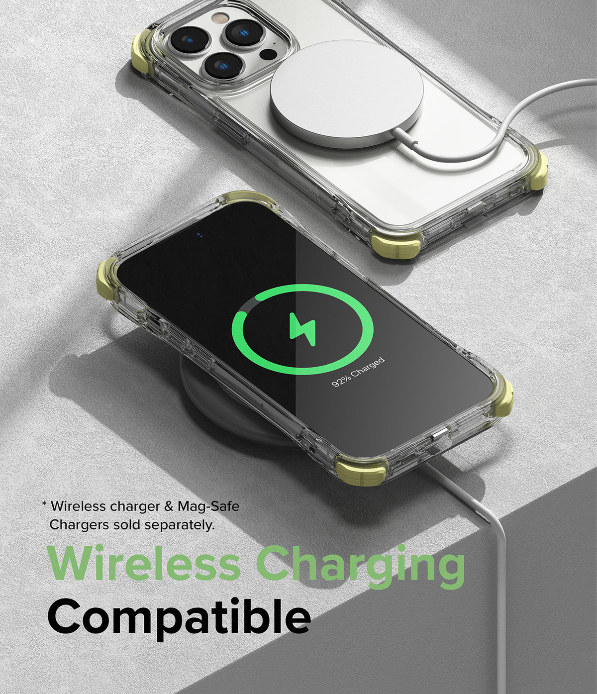 iPhone 14 Pro Case | Fusion Plus - Clear phone case with yellow corners on an iPhone 14 Pro charging wirelessly.