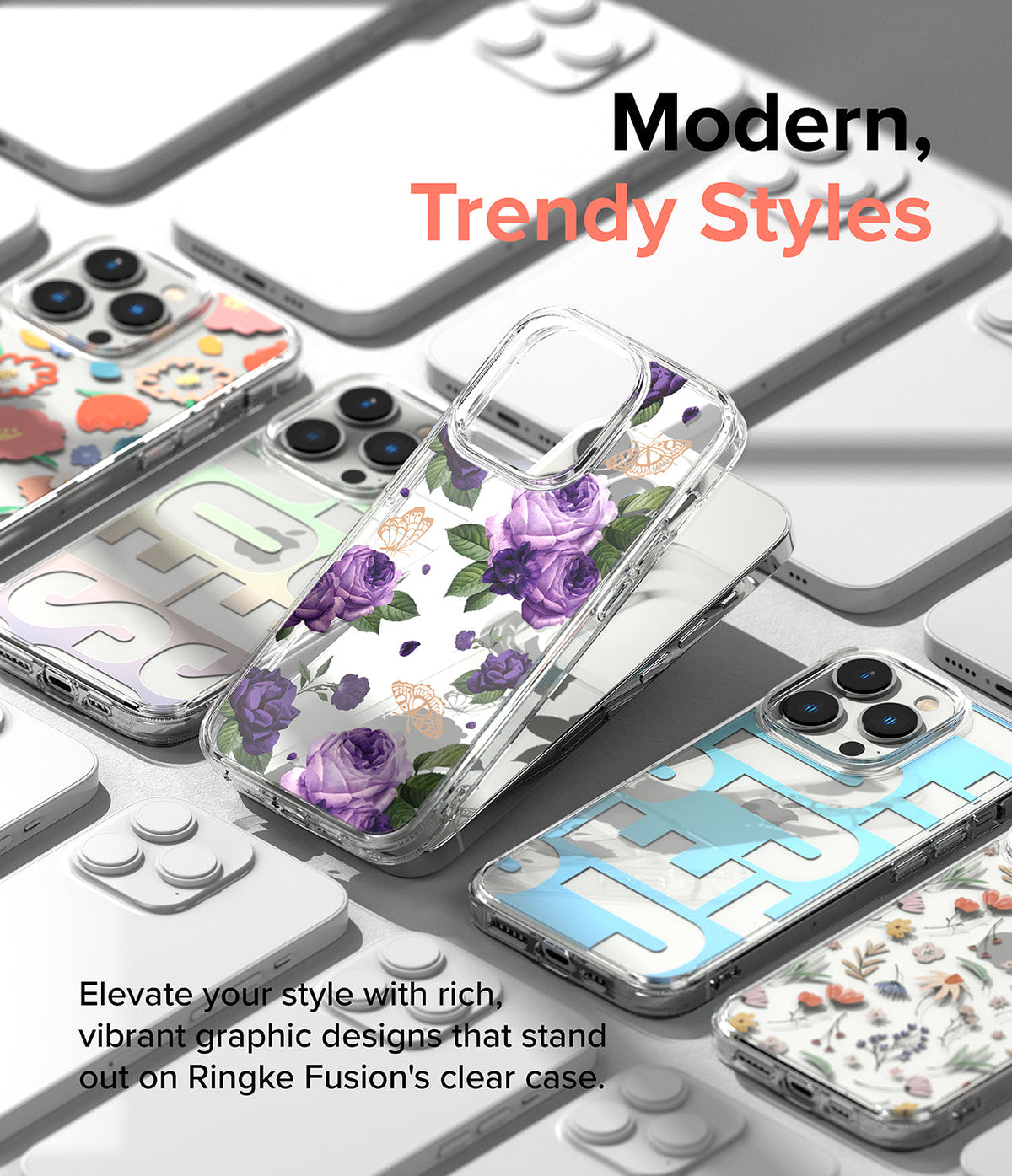 iPhone 14 Pro Case | Fusion Design - Clear iPhone 14 Pro cases with various floral and graphic patterns arranged on a surface.