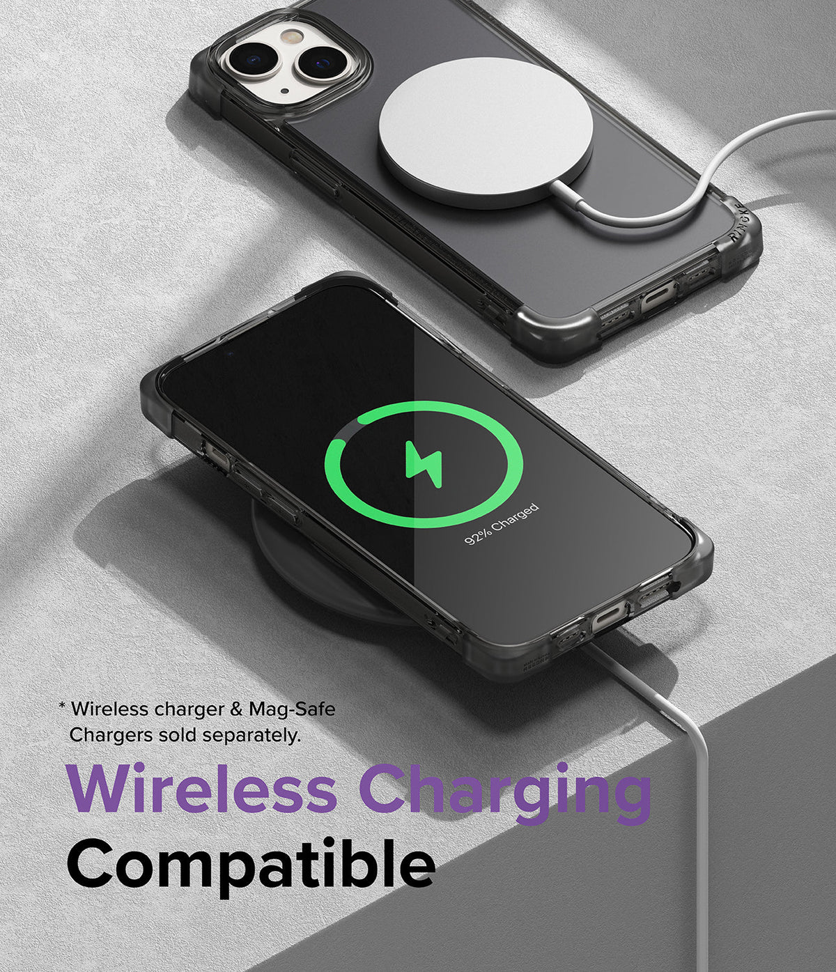 iPhone 14 Case | Fusion Bumper - iPhone 14 in a clear bumper case charging wirelessly with a MagSafe puck and a charging pad.