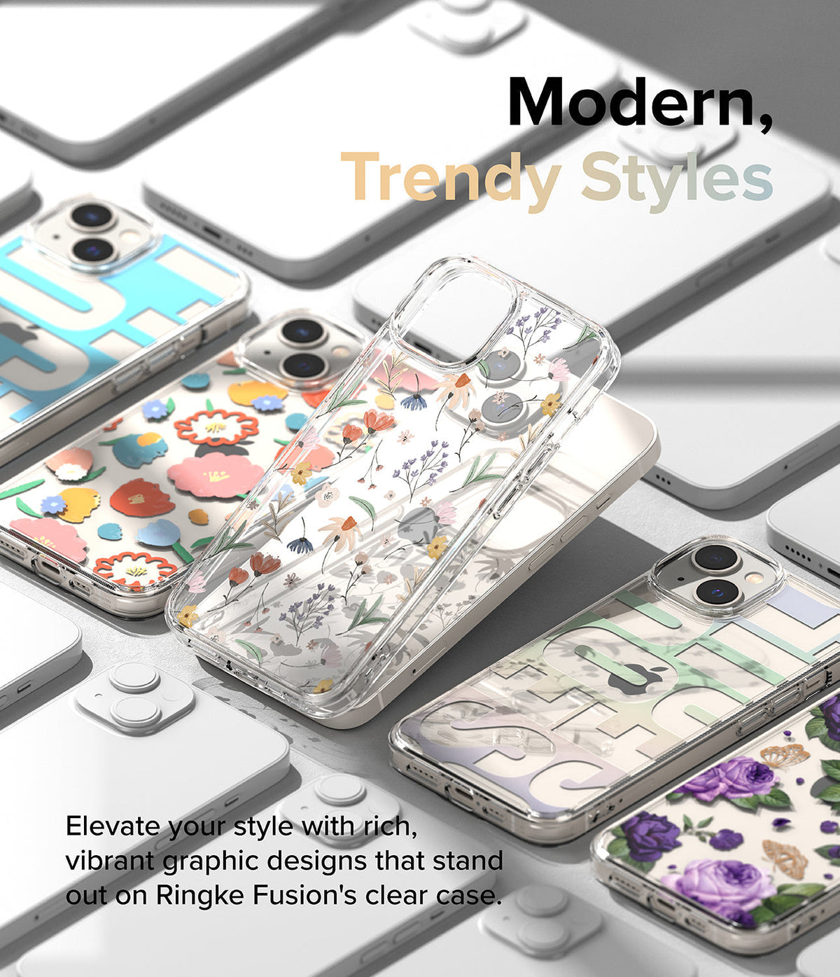 iPhone 14 Case | Fusion Design - Assorted clear iPhone cases with floral, butterfly, and graphic patterns arranged on a white surface.