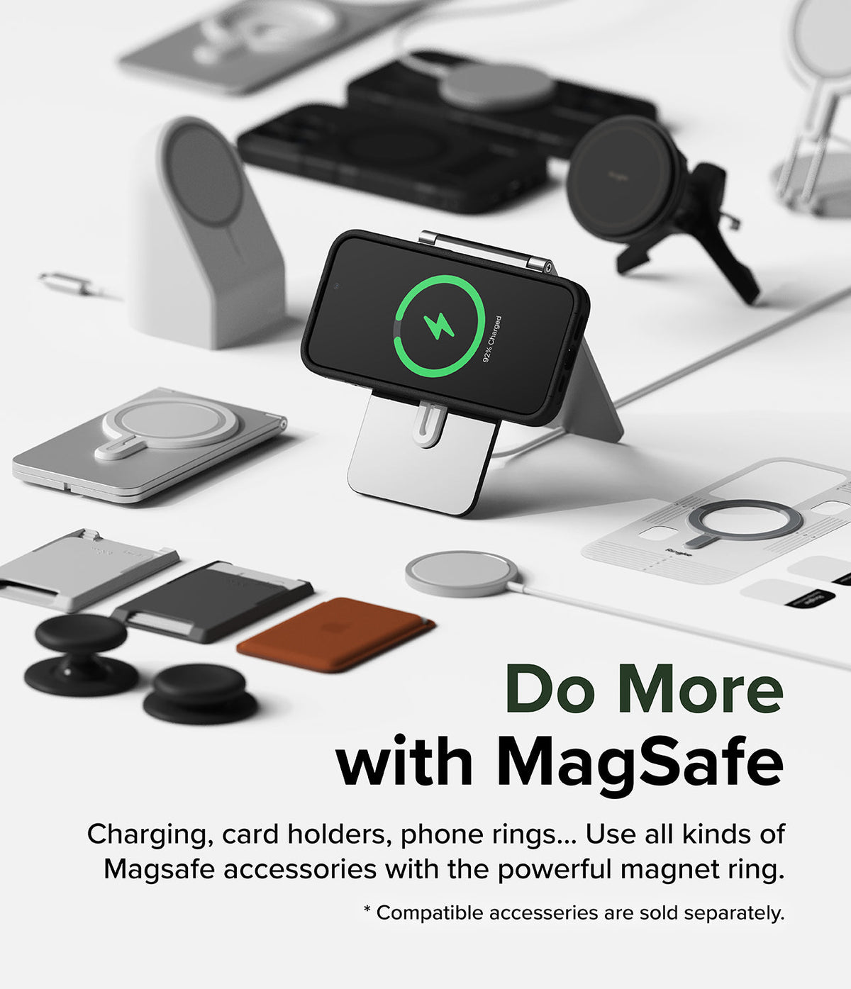 iPhone 15 Pro Max Case | Alles - iPhone 15 Pro Max on a charging stand surrounded by various MagSafe accessories on a white surface.