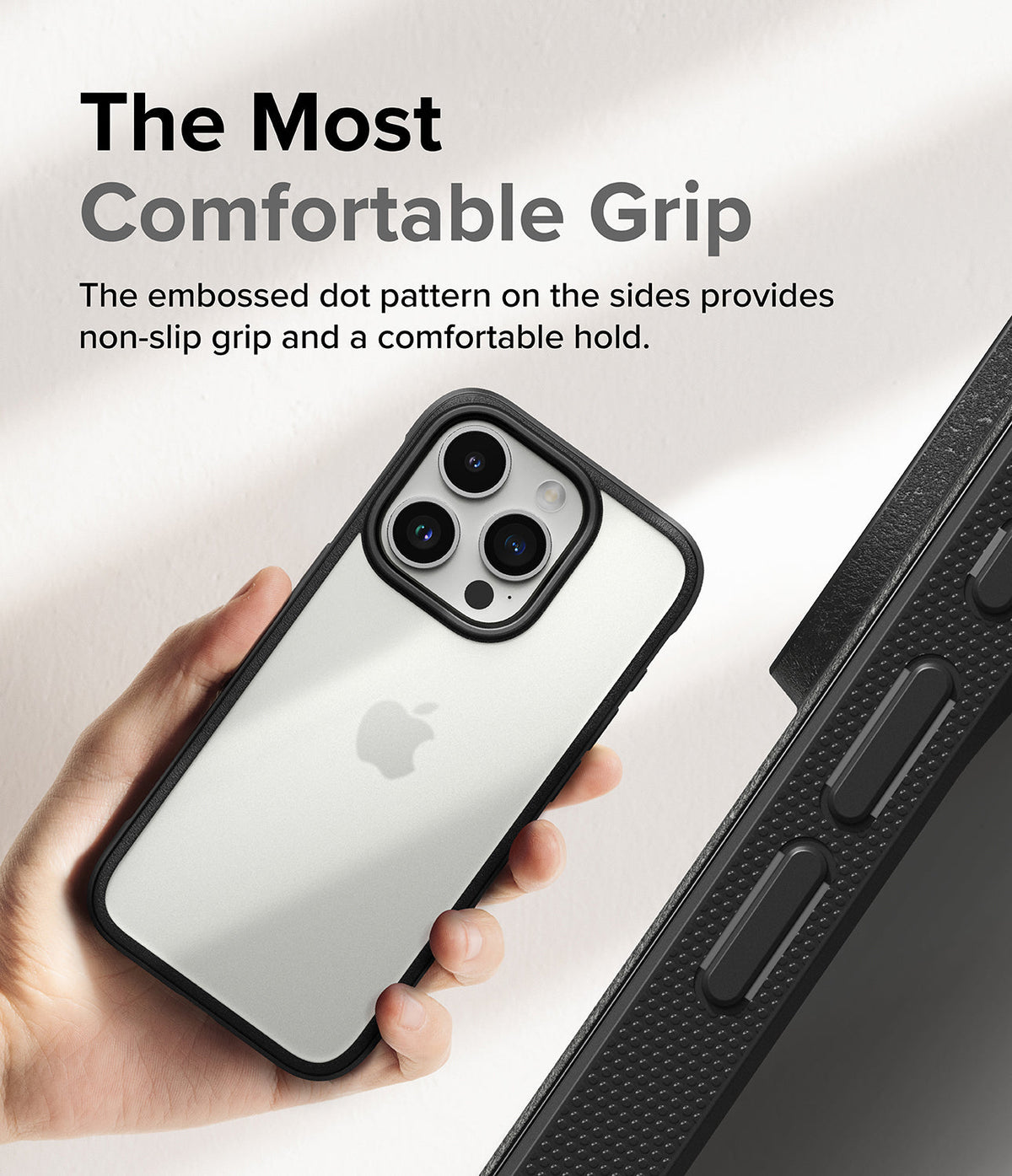 iPhone 15 Pro Max Case | Fusion Bold - Hand holding a phone in a black case with a textured, dotted side grip.