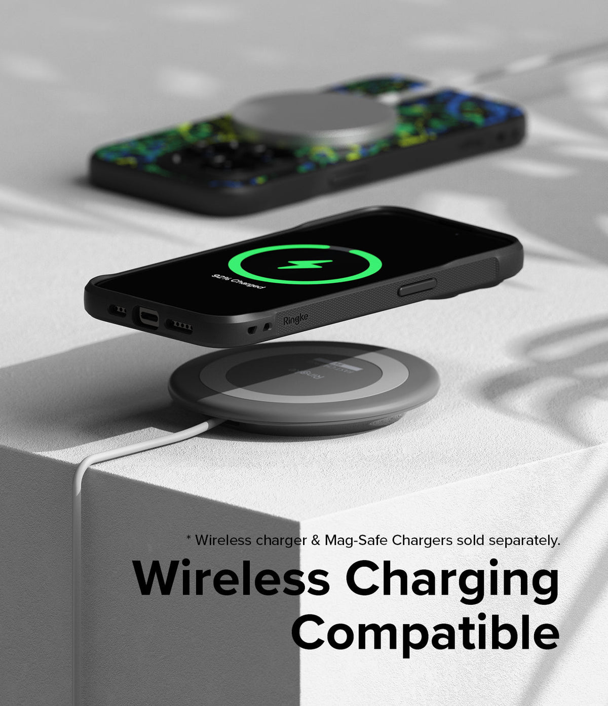 iPhone 15 Pro Max Case | Onyx Design - iPhone 15 Pro Max with Onyx case wirelessly charging on a circular pad.