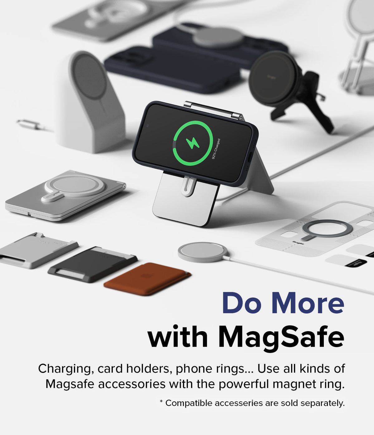iPhone 15 Pro Max Case | Silicone Magnetic - iPhone in a magnetic case charging on a stand surrounded by MagSafe accessories.