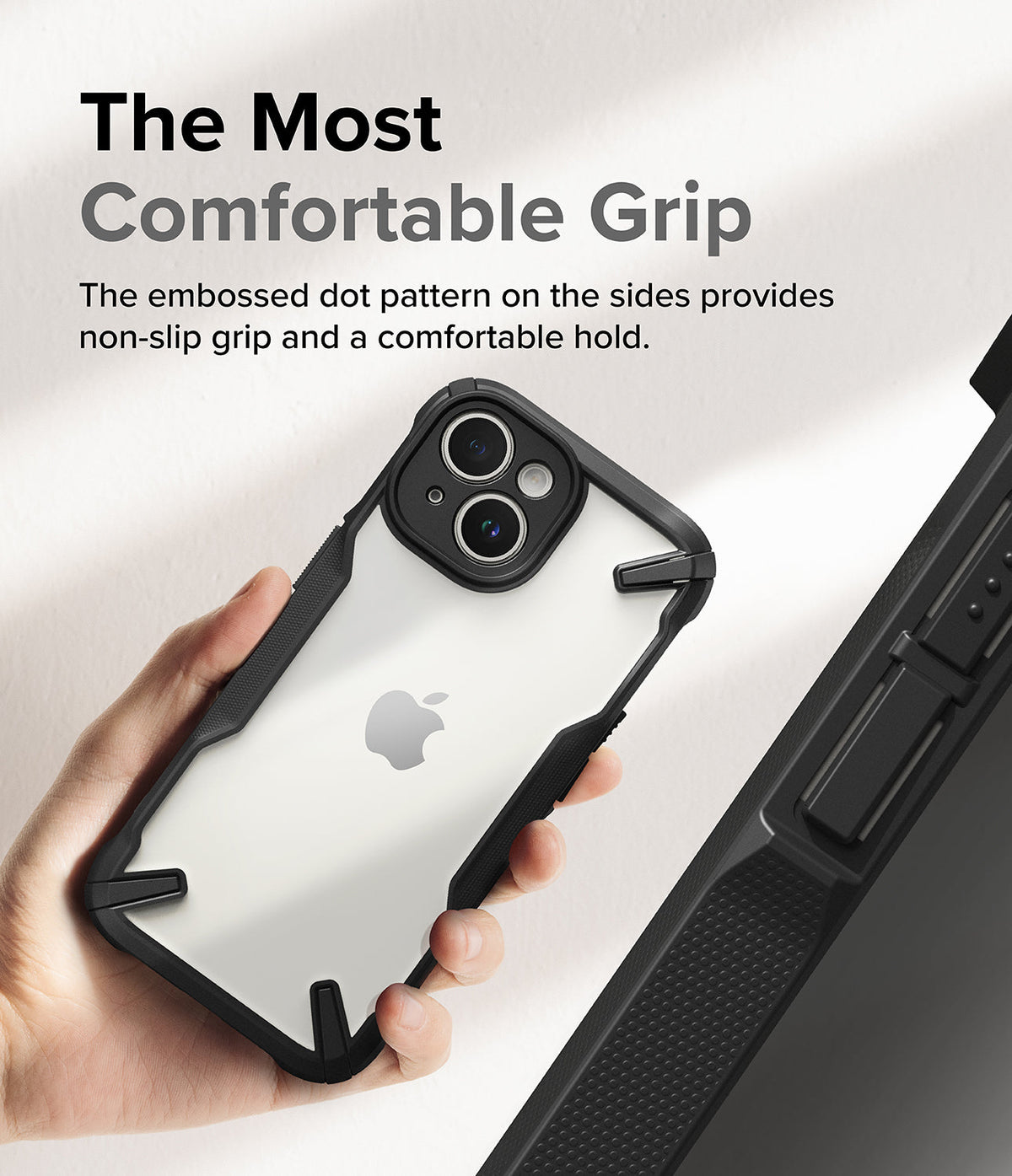 iPhone 15 Plus Case | Fusion-X - Hand holding a clear iPhone 15 Plus case with a black frame and textured side grip.