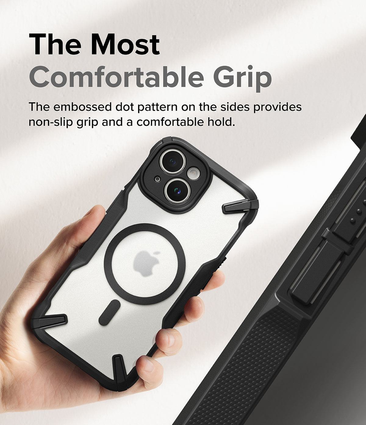 iPhone 15 Plus Case | Fusion-X Magnetic Matte Black - Hand holding a matte black phone case with a dot-textured grip.