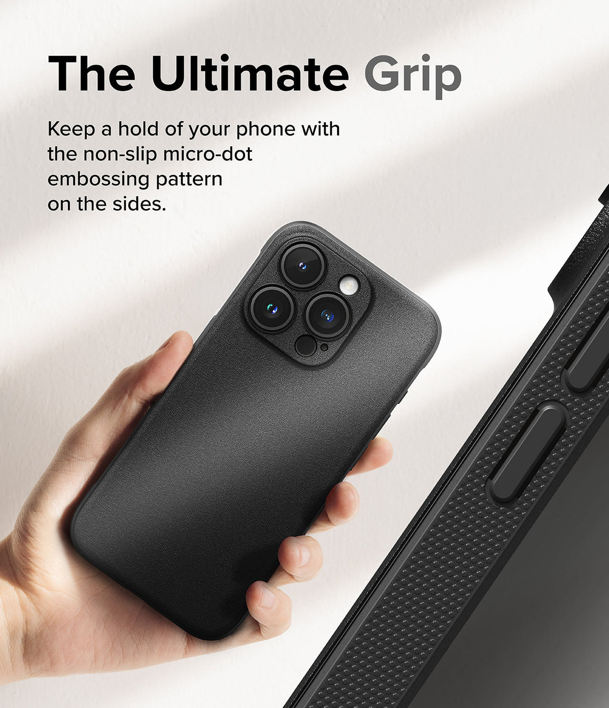 iPhone 15 Pro Case | Onyx - Hand holding a black phone case with a textured micro-dot side grip pattern.