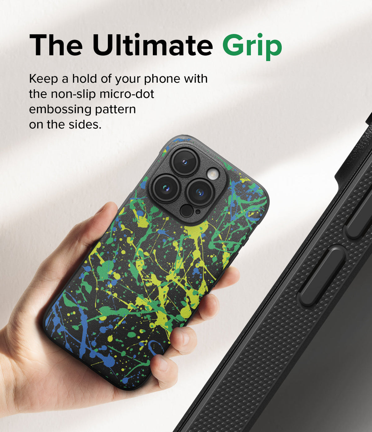 iPhone 15 Pro Case | Onyx Design - Hand holding a black phone case with a neon paint splatter pattern and textured micro-dot sides.