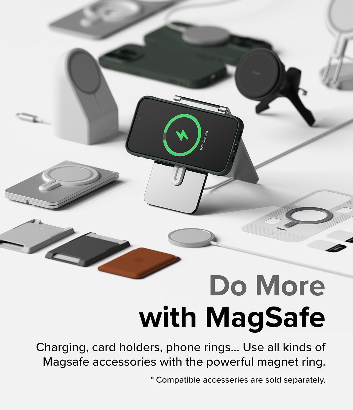 iPhone 15 Pro Case | Onyx Magnetic - iPhone 15 Pro on a charging stand surrounded by various MagSafe accessories on a white surface.