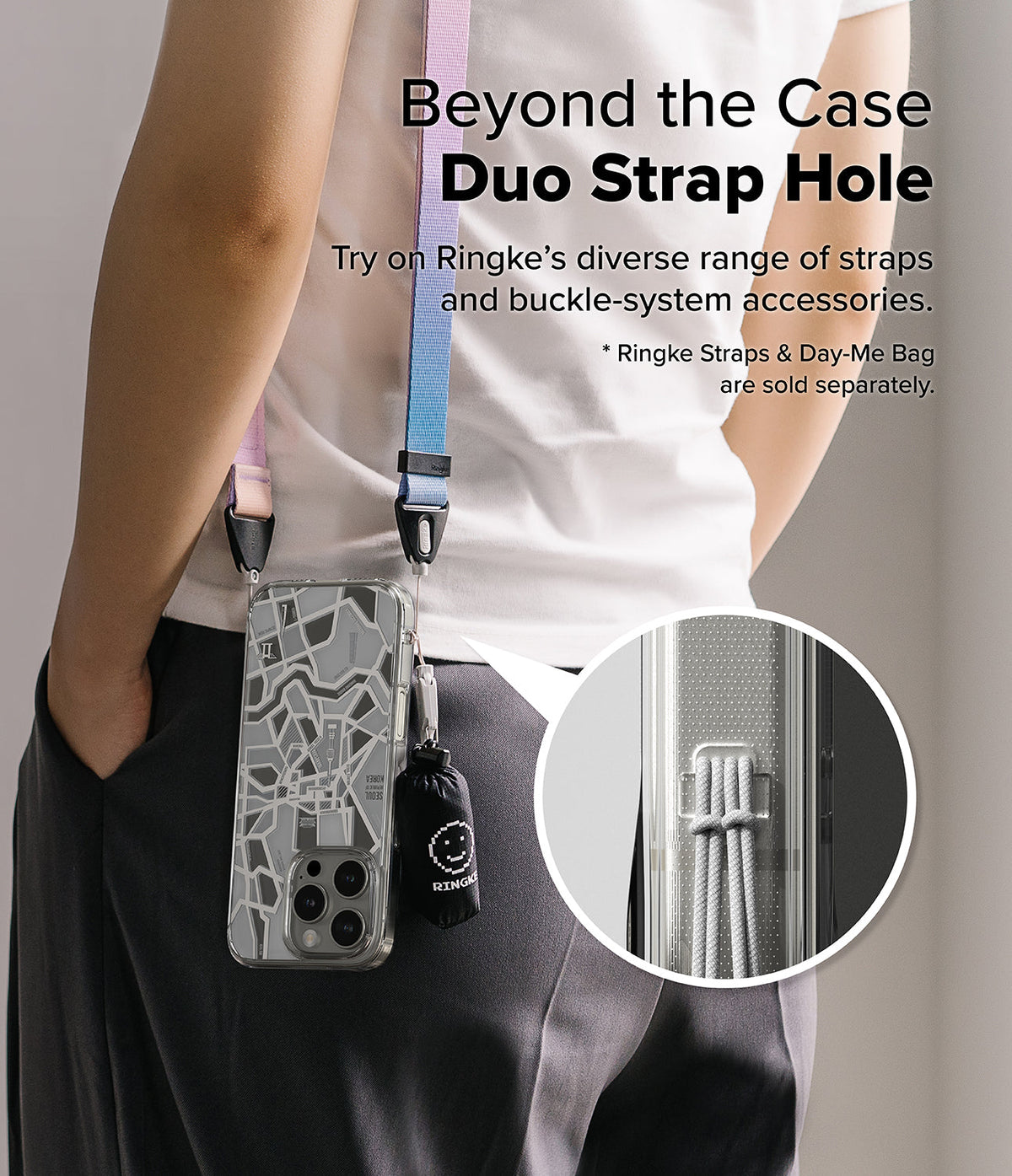 iPhone 16 Pro Max Case | Fusion Design - Person wearing a phone case with a map pattern and colorful strap, featuring a close-up of the dual strap hole.