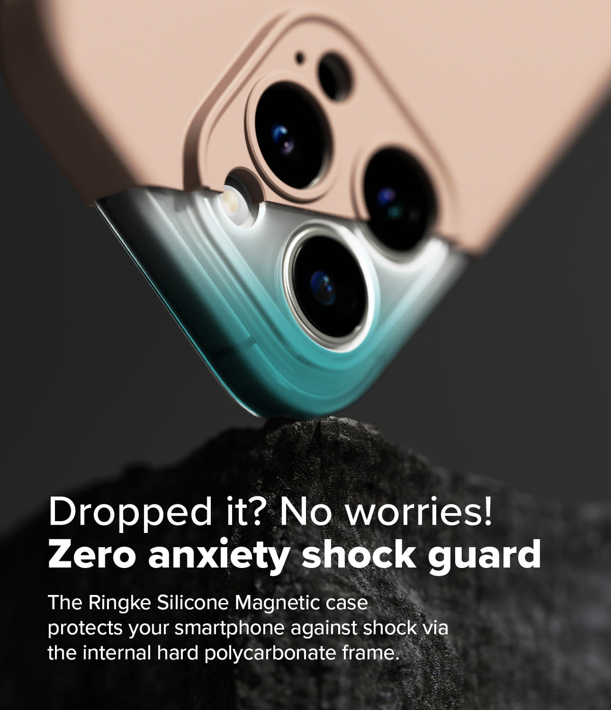 iPhone 16 Pro Max Case | Silicone Magnetic - Close-up of a phone camera module protected by a shock-absorbing case against a rock.
