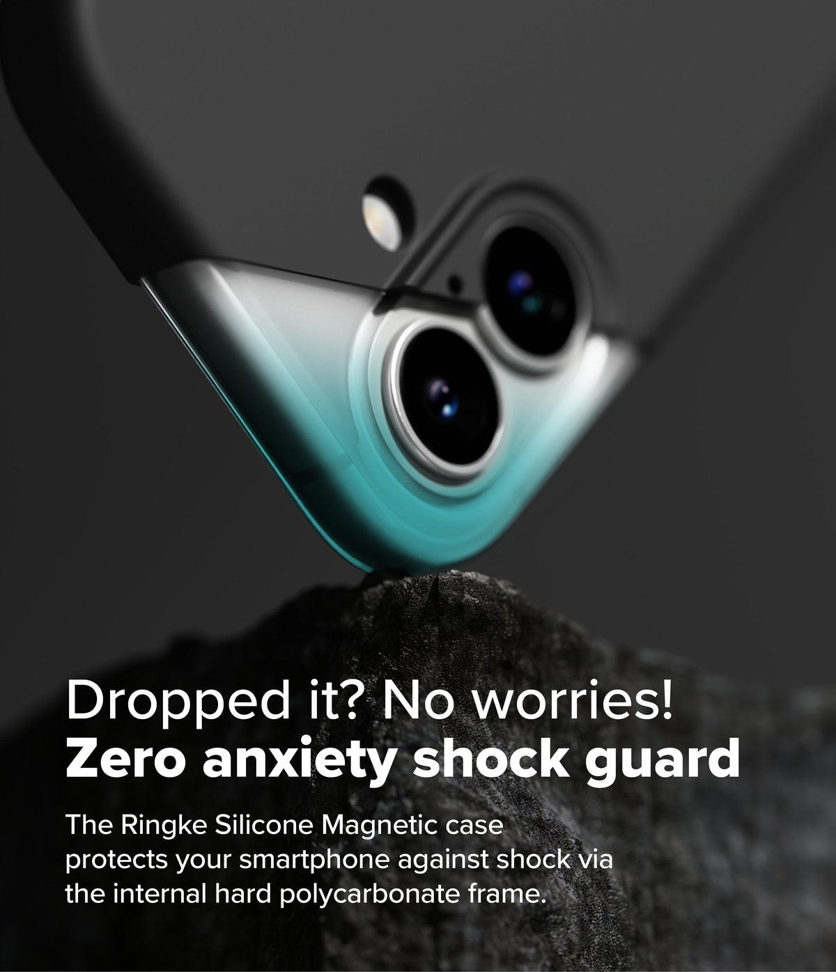 iPhone 16 Plus Case | Silicone Magnetic - Close-up of a phone case corner resting on a rock, highlighting the shock-absorbing frame.