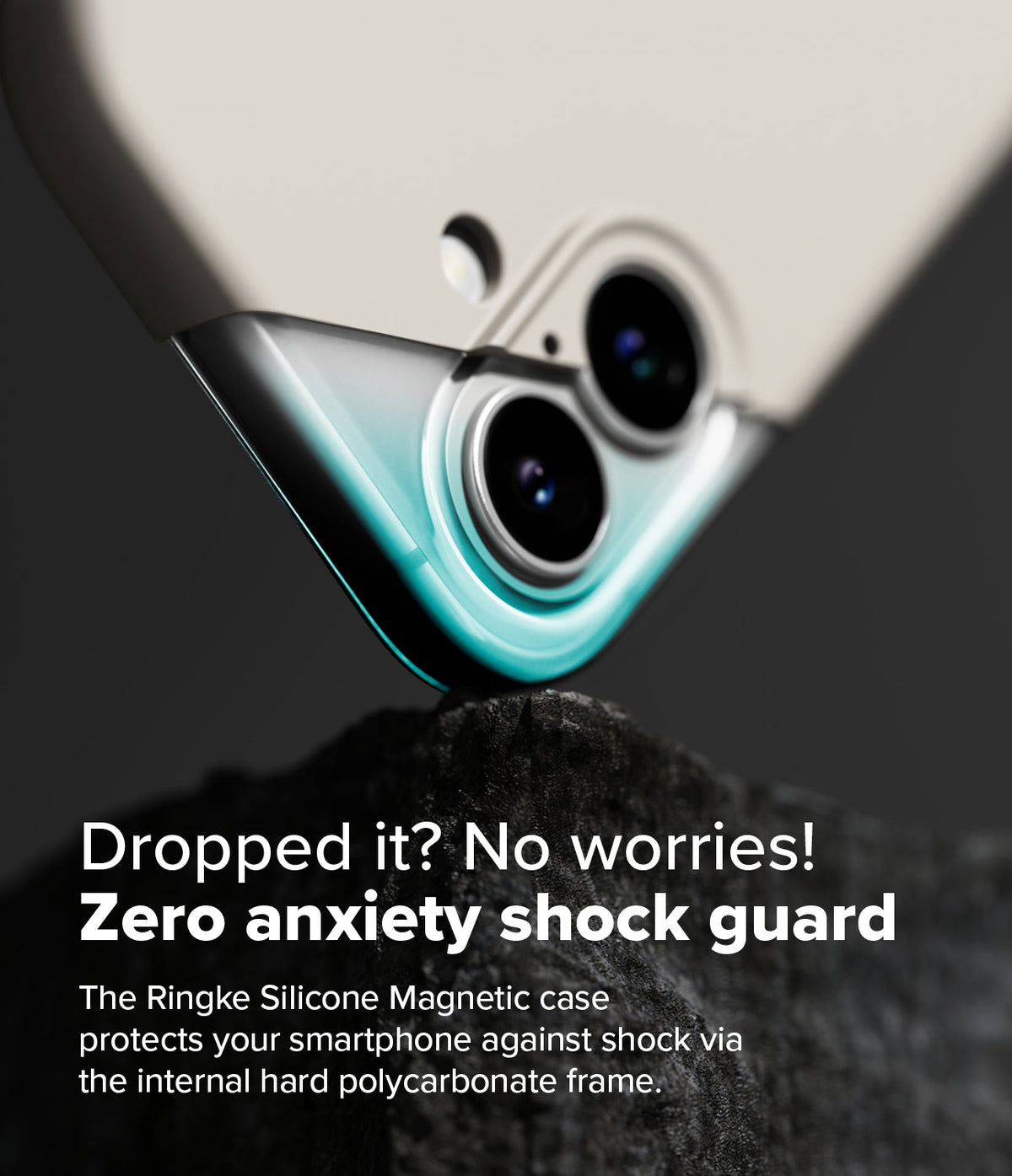 iPhone 16 Plus Case | Silicone Magnetic - Close-up of a phone case corner resting on a rock, highlighting the shock-guard frame.