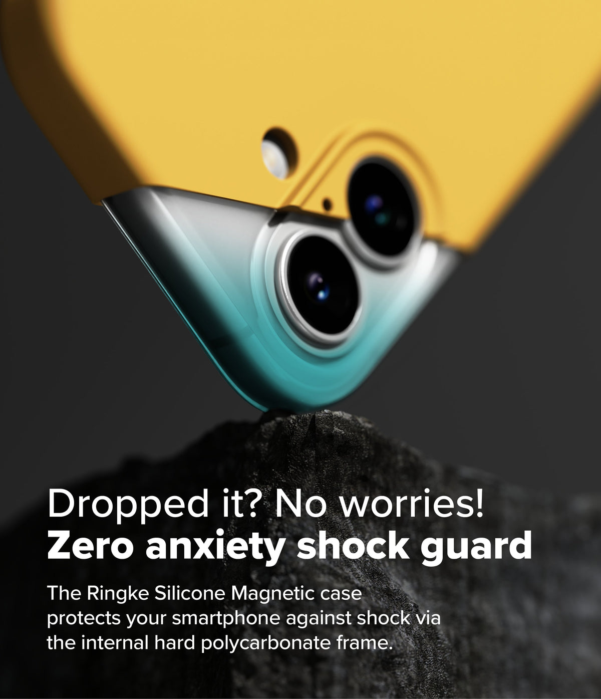 iPhone 16 Plus Case | Silicone Magnetic - Yellow phone case corner resting on a dark rock, highlighting shock protection.