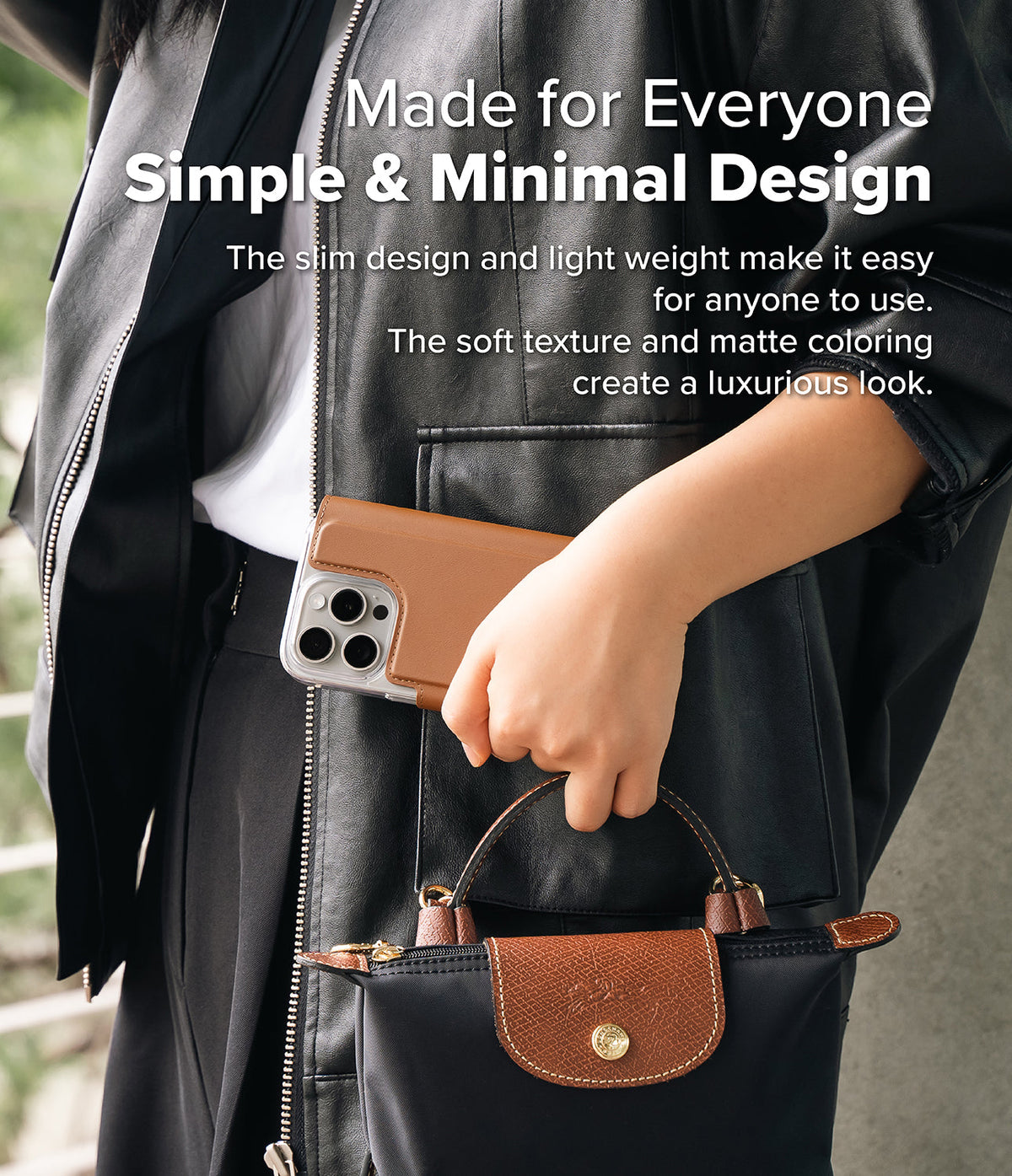 iPhone & Pro MagSafe Cover | Folio Wallet Magnetic - Person in a leather jacket holding a brown folio phone case.