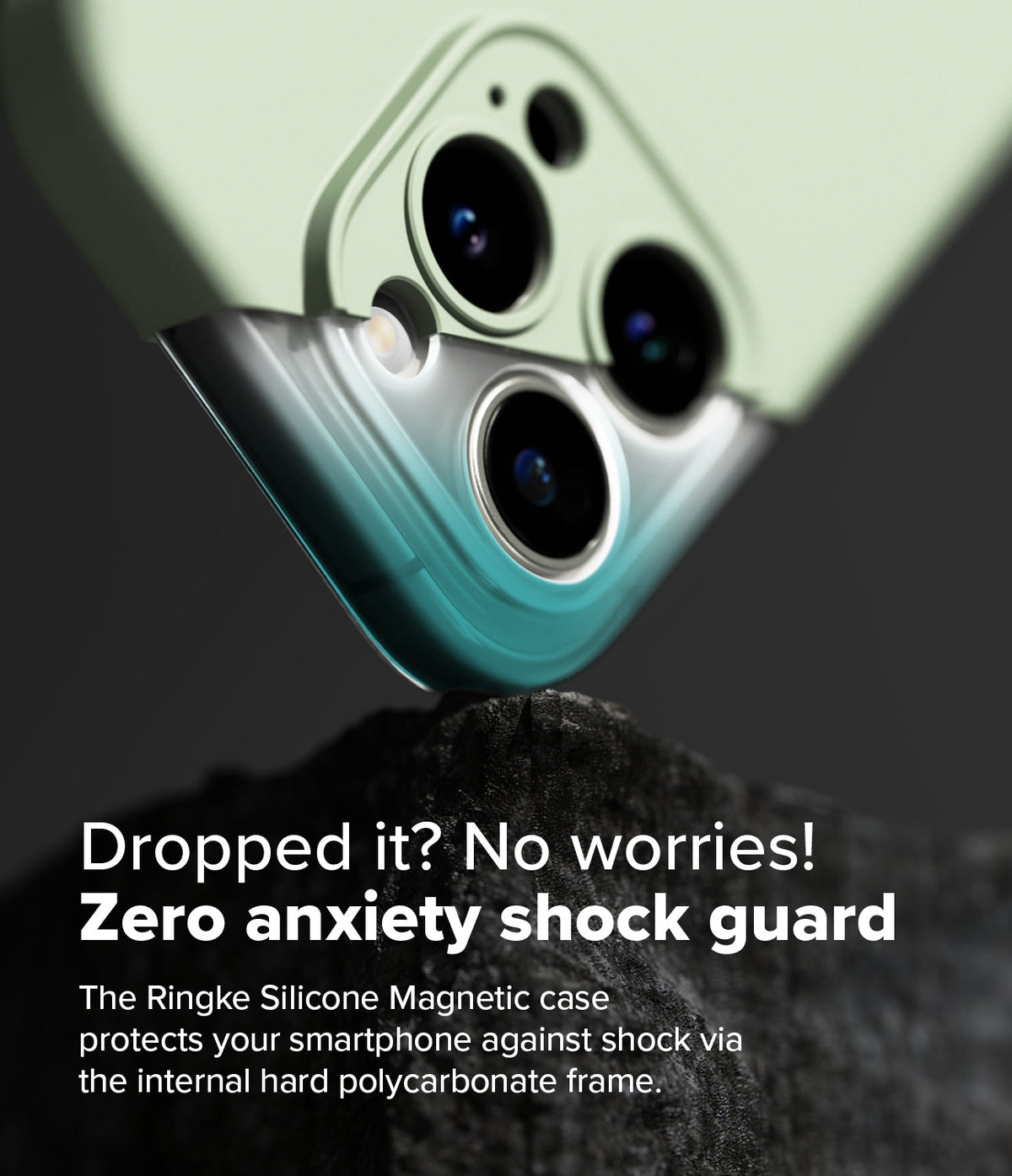 iPhone 16 Pro Case | Silicone Magnetic - Light green phone case resting on a dark rock, highlighting the shock-resistant frame.