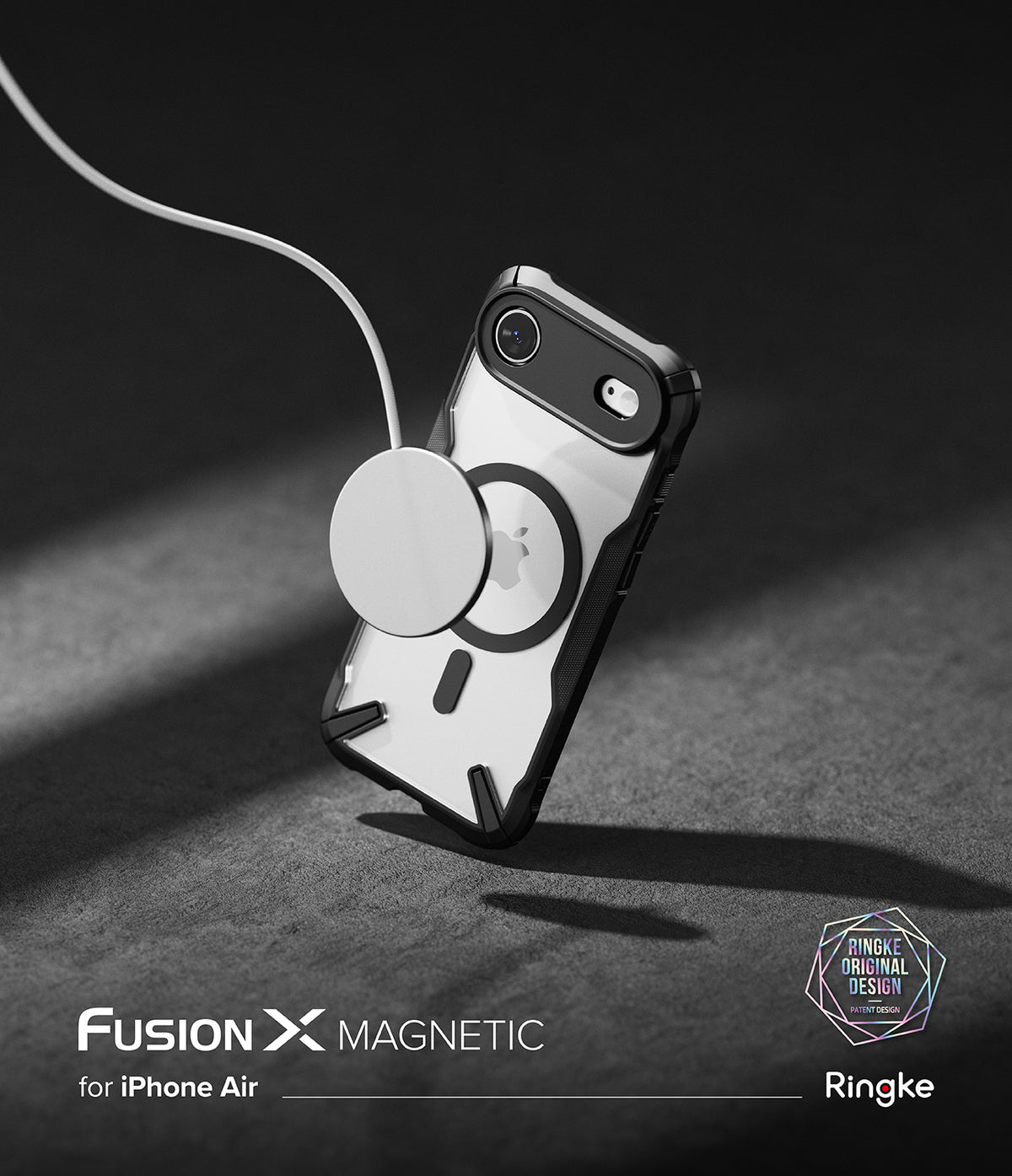 iPhone Air Case | Fusion-X Magnetic - A clear phone case with a magnetic charger attached, resting on a dark surface.