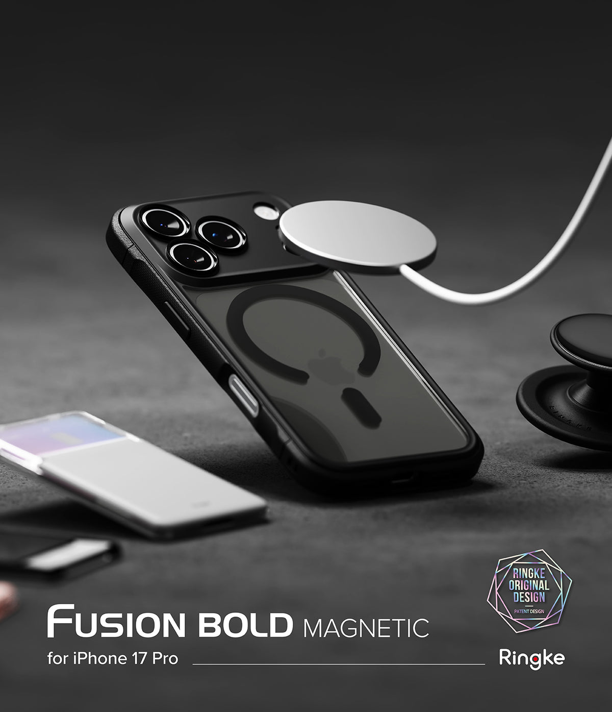iPhone 17 Pro Case | Fusion Bold Magnetic Matte - Matte black phone case with magnetic ring charging on a dark surface.
