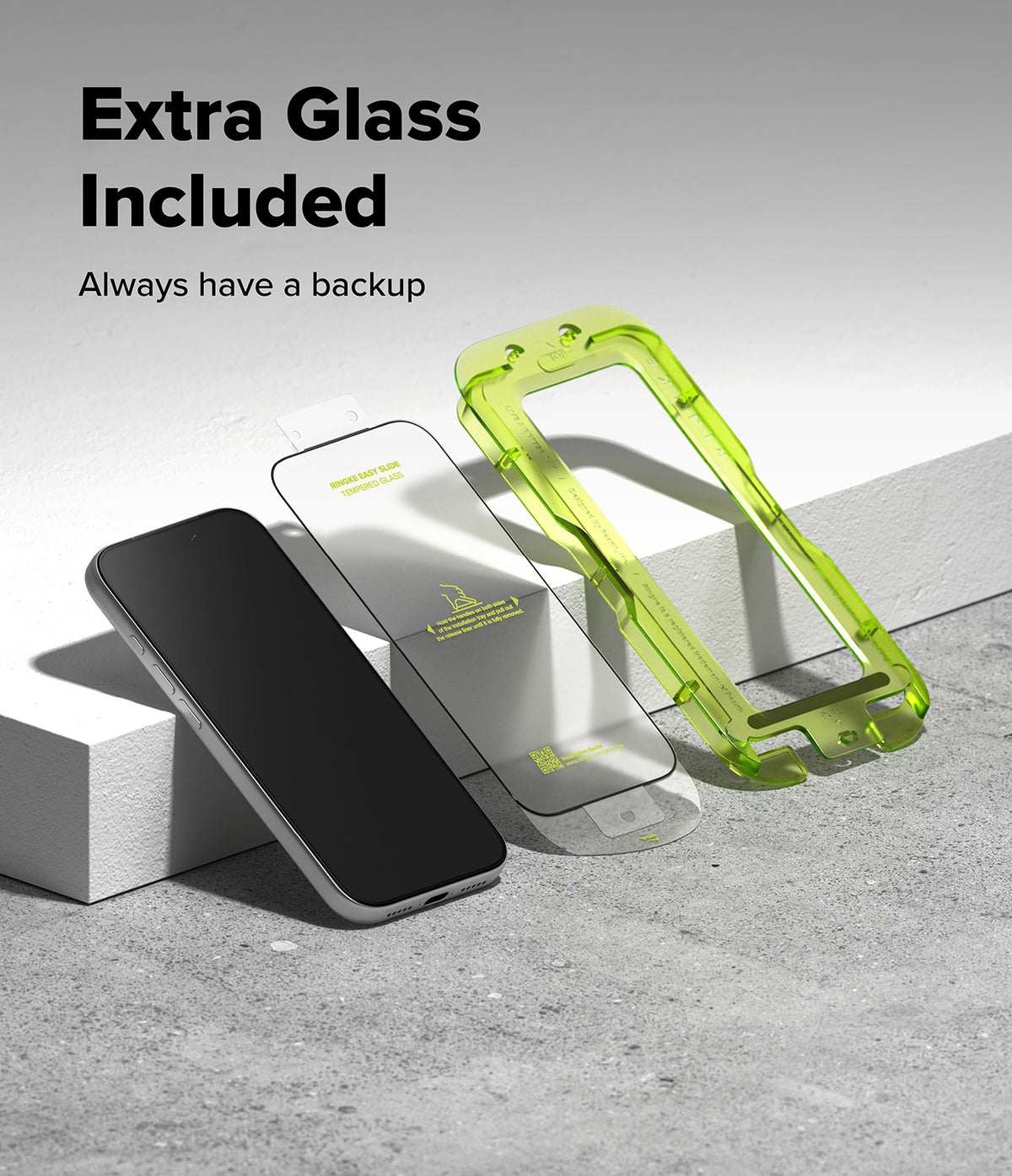 iPhone 18 Pro Max Screen Protector | Easy Slide Tempered Glass (2 Pack) - A smartphone shown with two screen protector films: one clear film and one bright translucent lime-green protective case or film. Large text at the top reads 'Extra Glass Included' and 'Always have a backup' on a clean gray studio background.