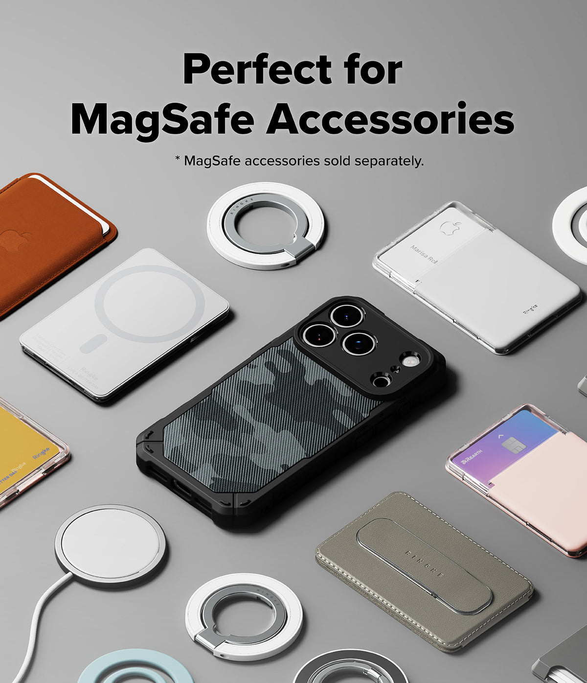 iPhone 18 Pro Case | Rugged Gear Magnetic - A smartphone case with a dark gray and black camouflage pattern is shown in a styled flat-lay arrangement with various MagSafe accessories on a light gray background. Text at the top reads 'Perfect for MagSafe Accessories' with a note that MagSafe accessories are sold separately.