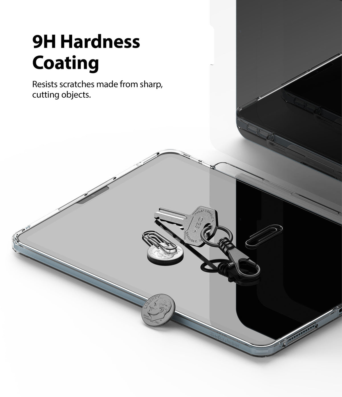 Invisible Defender Glass | iPad - Keys, paperclip, and coin resting on an iPad screen protected by 9H hardness glass.