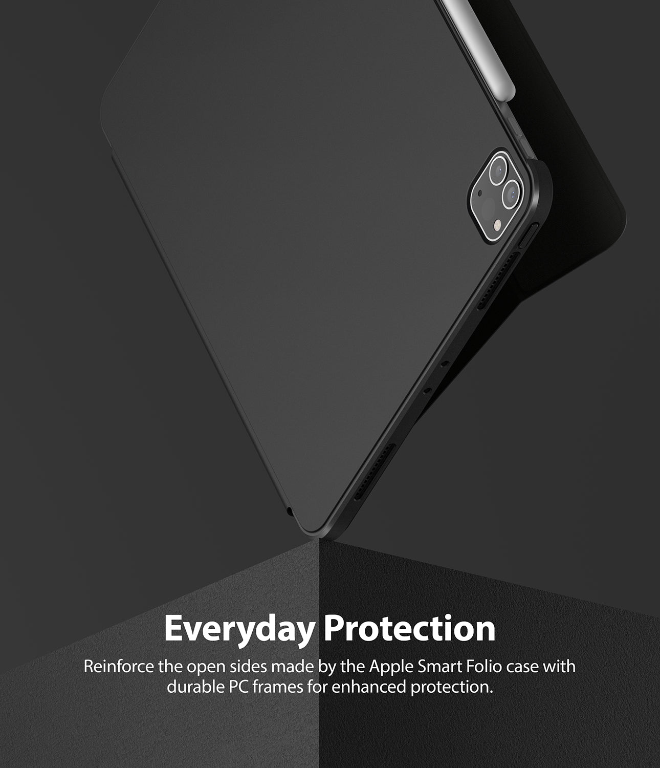 Frame Shield | iPad - Black protective frame attached to an iPad with a camera cutout and stylus resting on a dark corner.