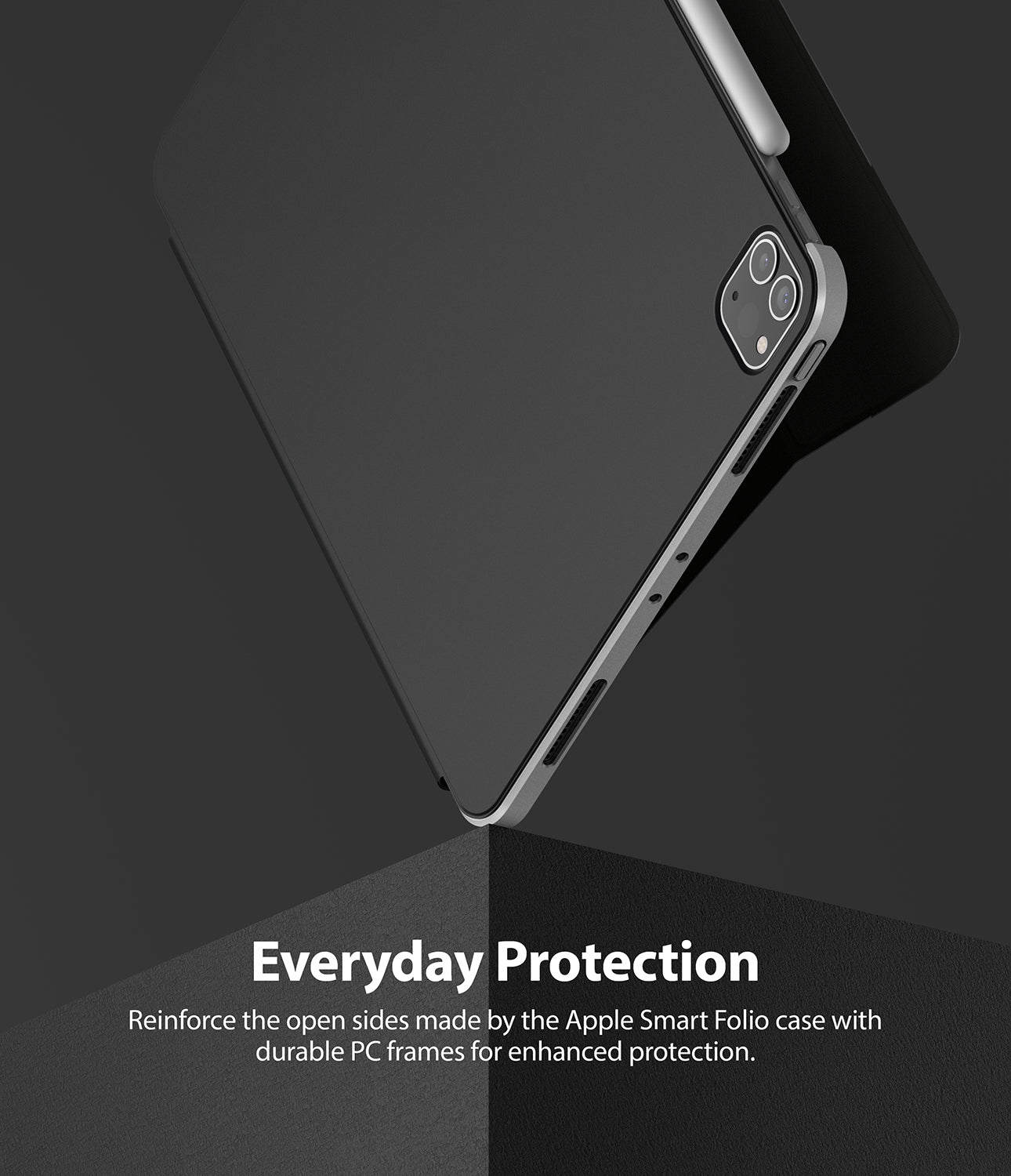 Frame Shield | iPad - iPad with a protective frame attached to the side, resting on a dark geometric surface.