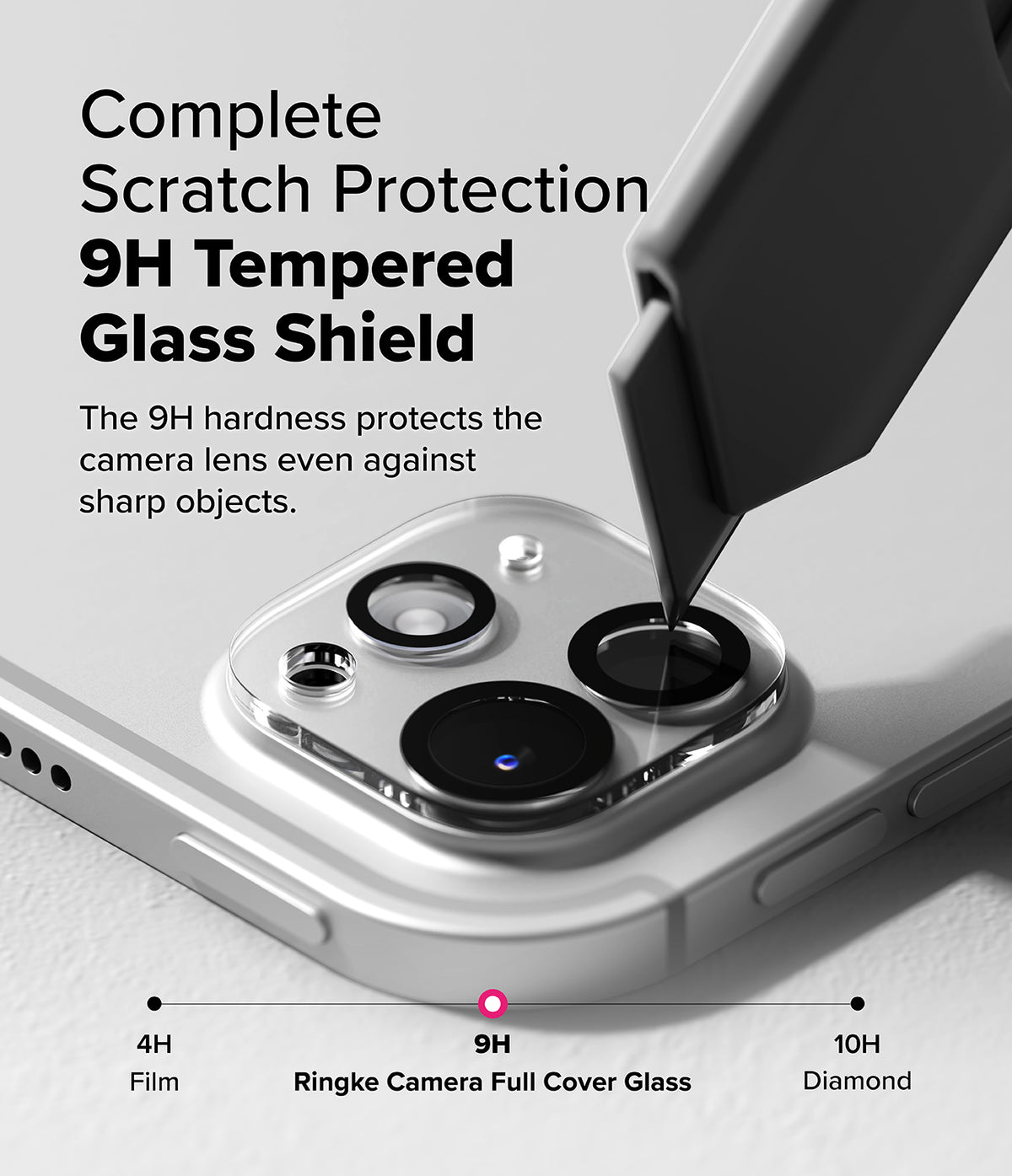 Camera Glass | iPad - A sharp tool scratches a 9H tempered glass camera lens protector on an iPad, demonstrating scratch resistance.