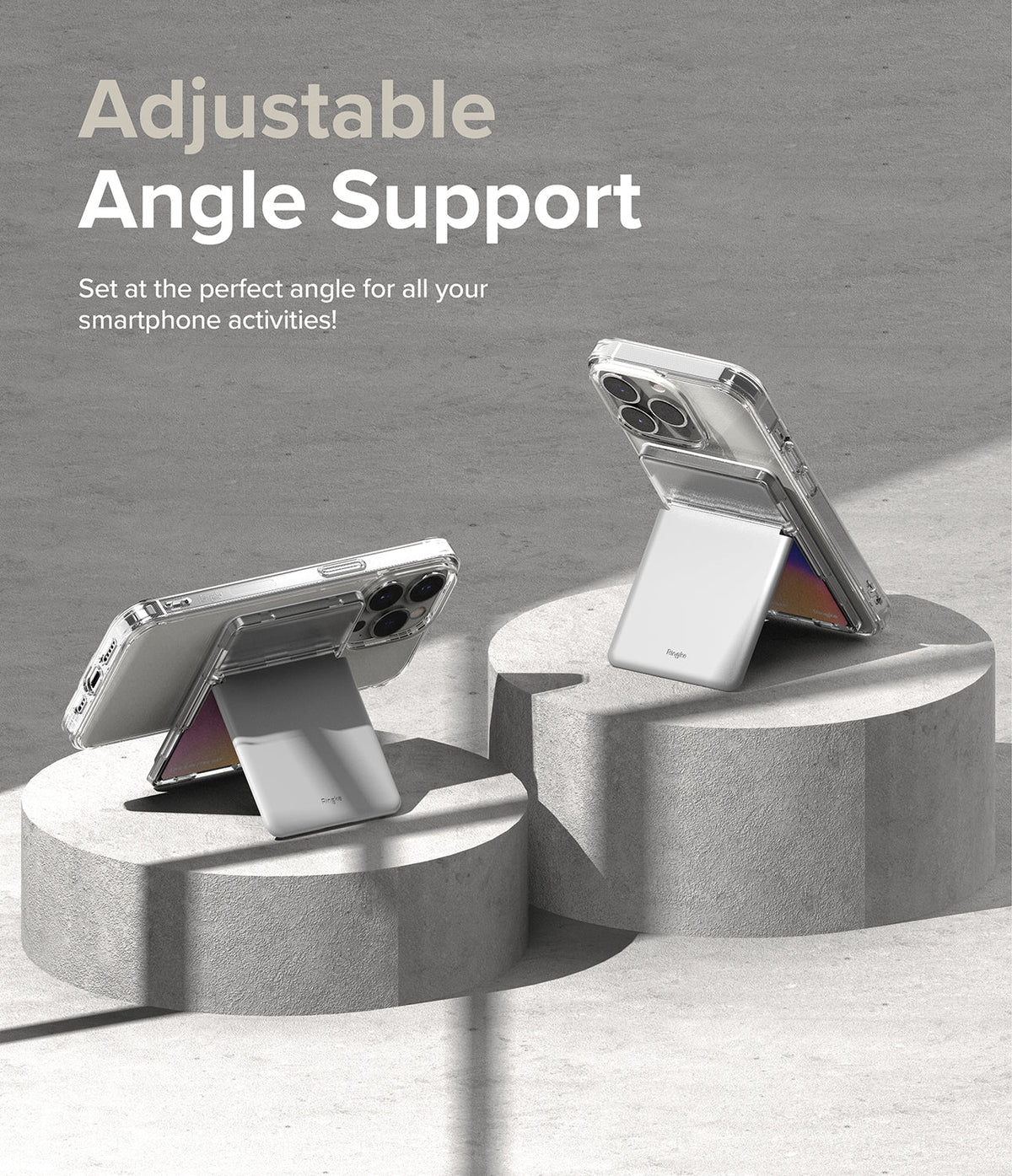 Card Holder | Magnetic Stand Slot - Two smartphones in clear cases propped up on gray cylindrical pedestals using magnetic stands.