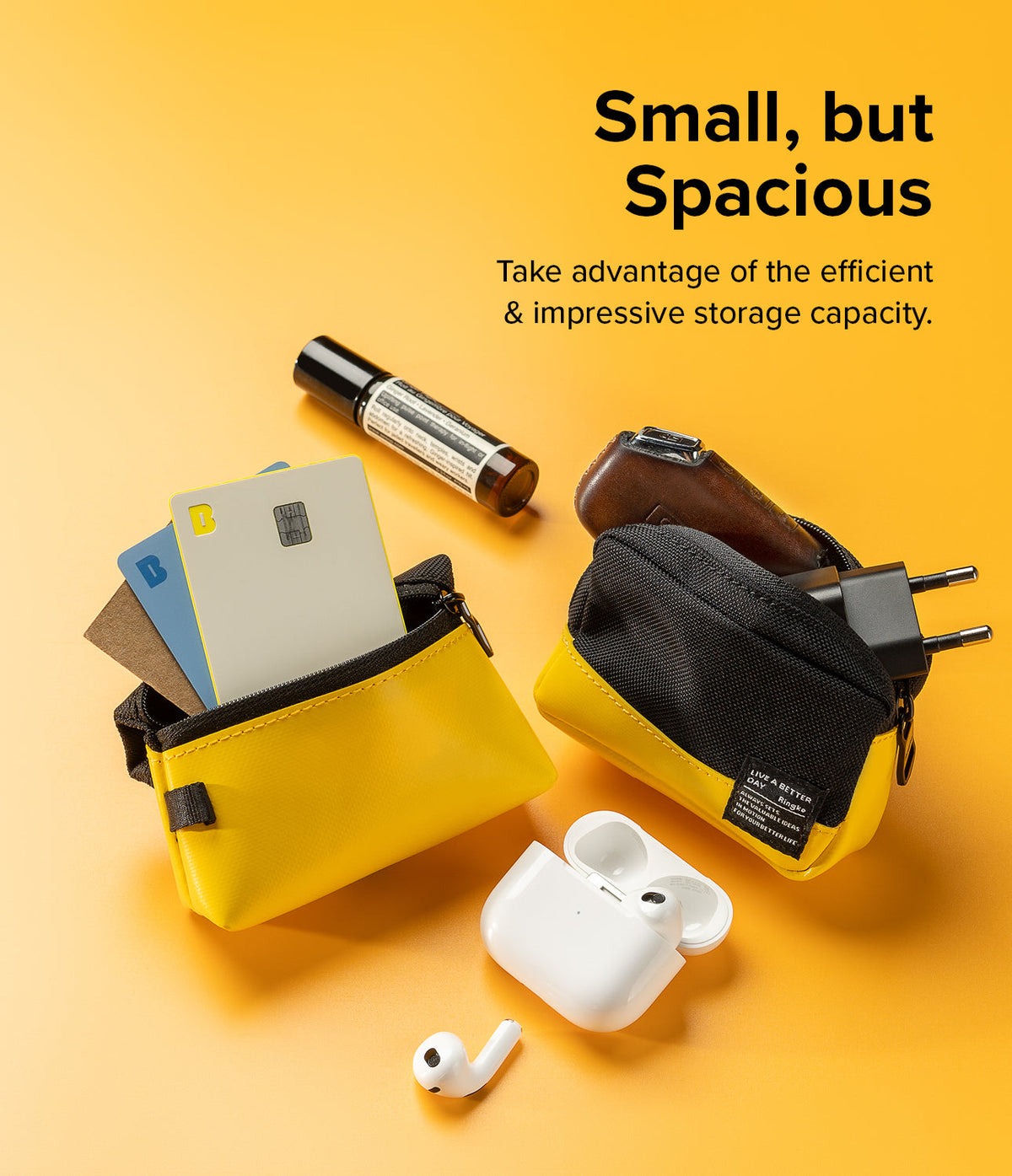 Mini Pouch Tarpaulin | Roll Top - Two yellow and black pouches on a yellow background holding cards, a charger, and earbuds.