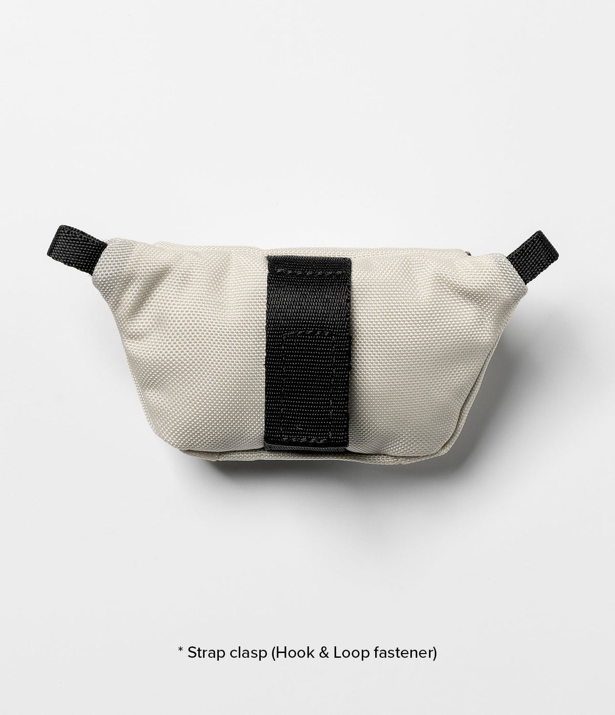 Mini Pouch | Sling Bag - Off-white fabric pouch with a central black vertical strap and small black side loops on a white background.