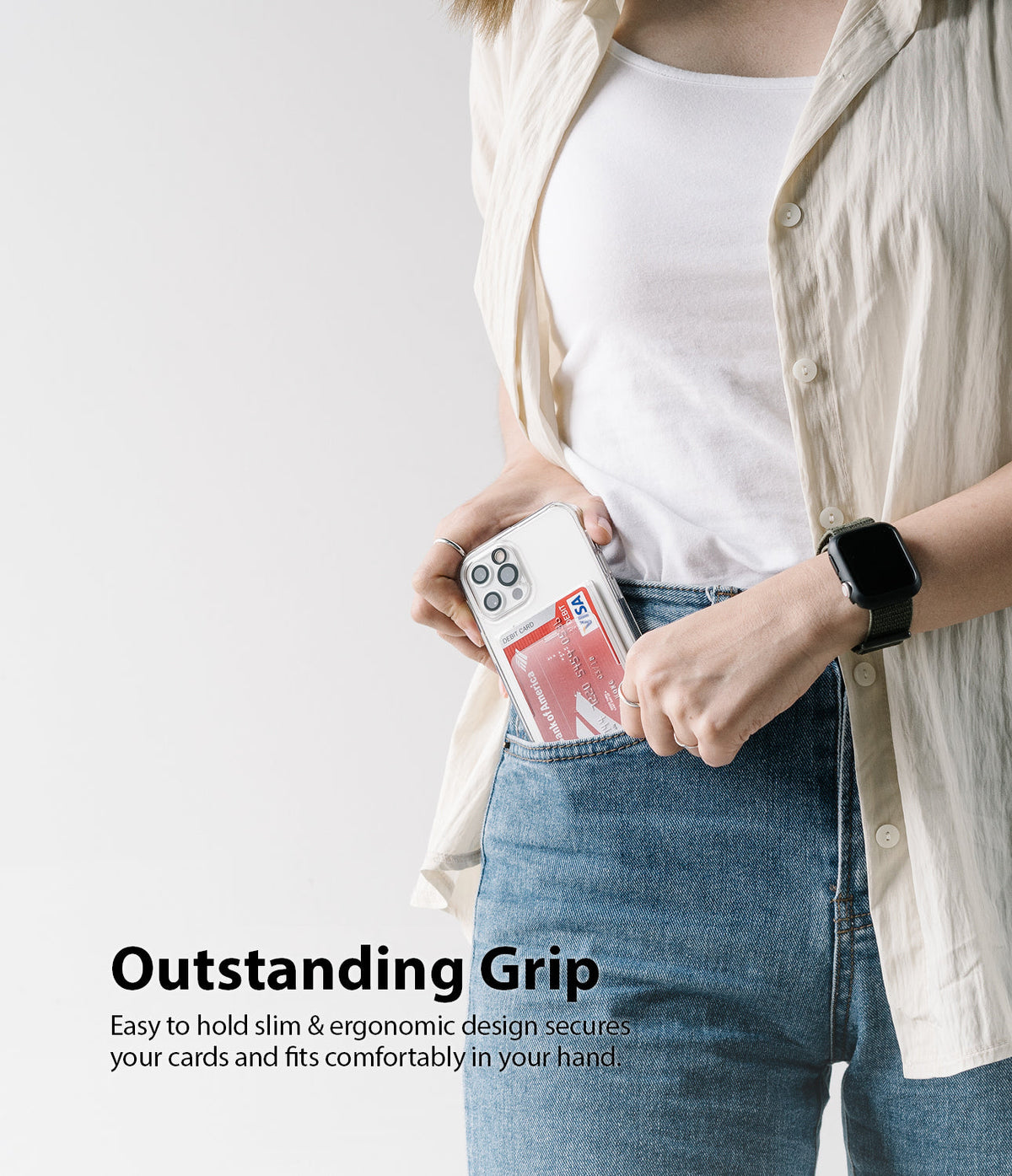 Card Holder | Magnetic Slot - Person holding a clear phone case with a credit card in the magnetic slot while sliding it into a pocket.