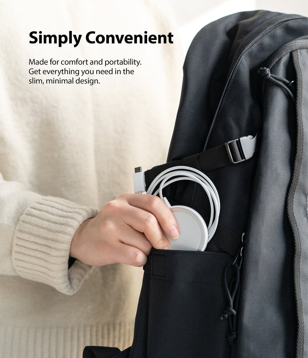 MagSafe Charger Case | Slim - Hand placing a white MagSafe charger into the side pocket of a black backpack.