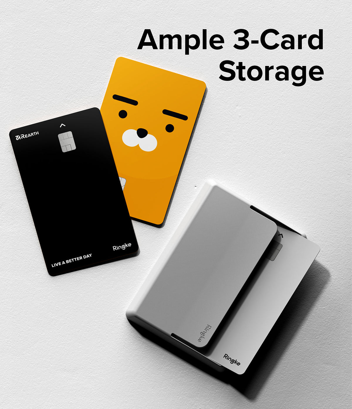 Card Holder | Magnetic Side Slot - A white magnetic card holder next to a black card and a yellow character card on a white surface.