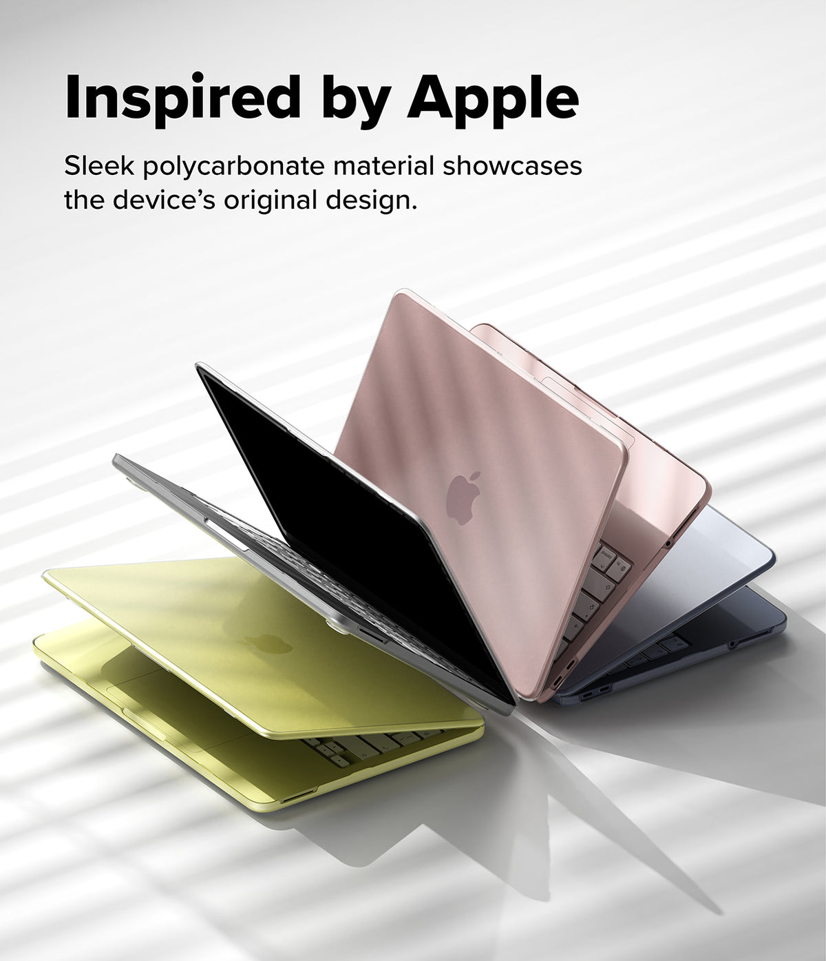 MacBook Neo Case + Protector all-groups - Three slim aluminum laptop skins or covers in yellow-green, rose gold, and dark gray are shown partially open in a fan arrangement on a white background with soft diagonal shadows. Text at the top reads 'Inspired by Apple' and 'Sleek polycarbonate material showcases the device's original design.