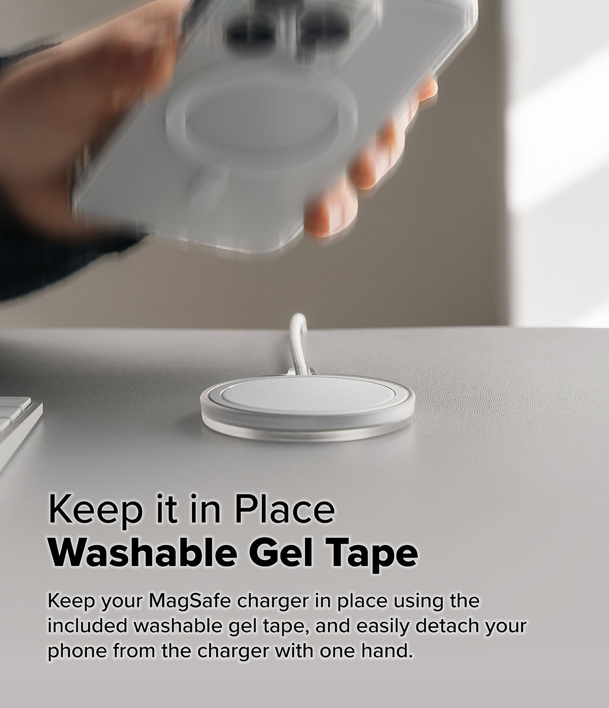 MagSafe (2024) Charger Case | Slim - Matte Clear - Hand lifting a phone from a MagSafe charger secured to a desk.