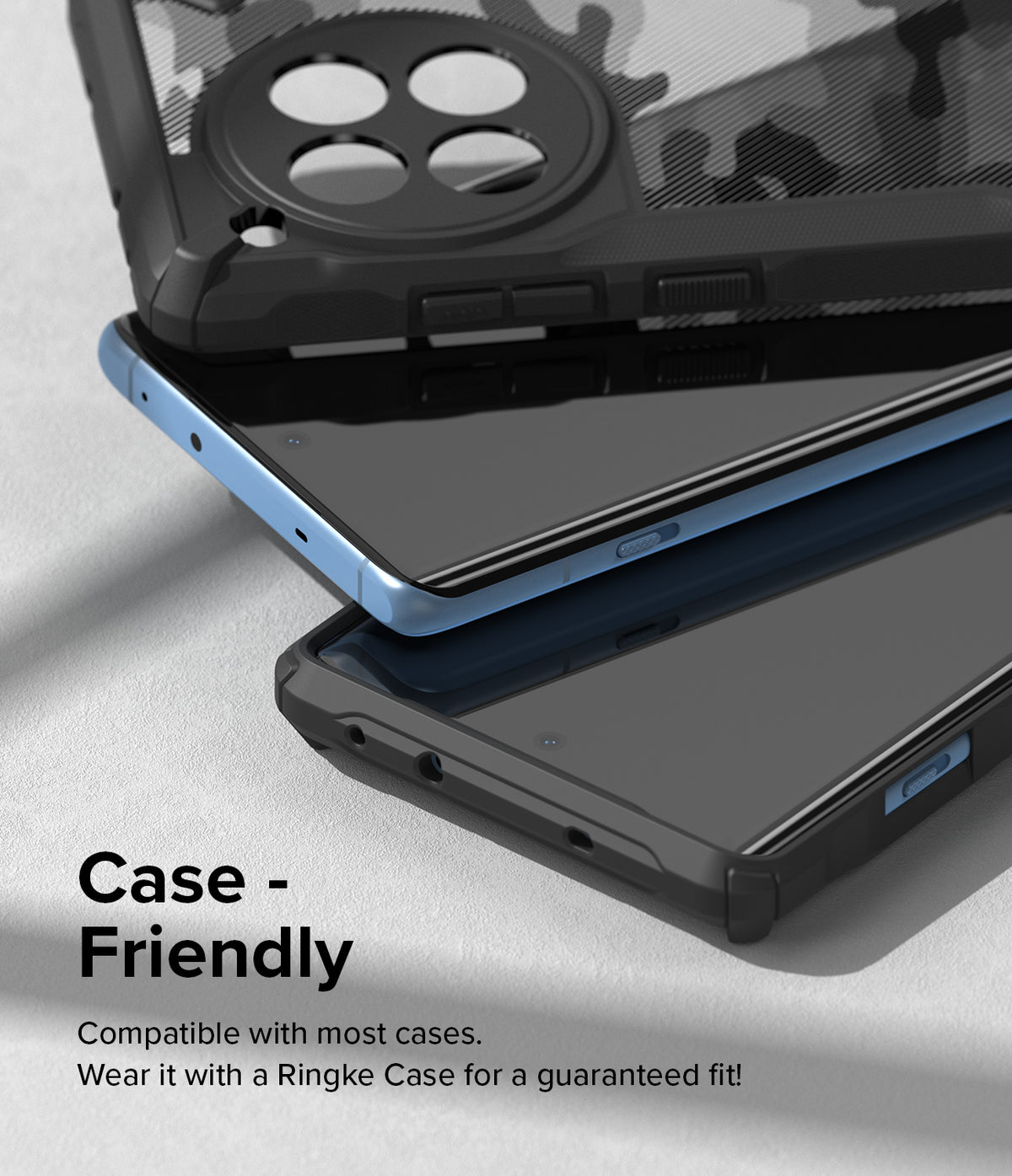 OnePlus 12R Screen Protector | Dual Easy Film - OnePlus 12R Screen Protector - A blue smartphone with a screen protector being inserted into a black camouflage phone case.