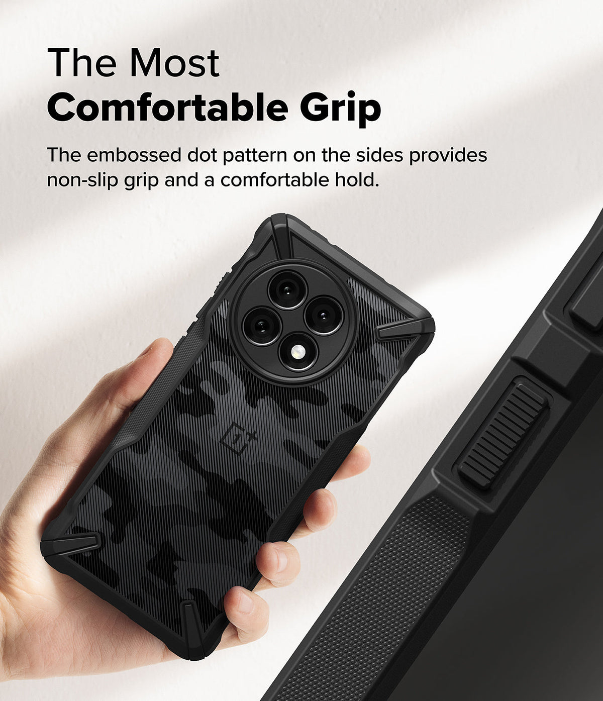 OnePlus 13R Case | Fusion-X - Hand holding a black camo phone case with textured side grips and a circular camera cutout.