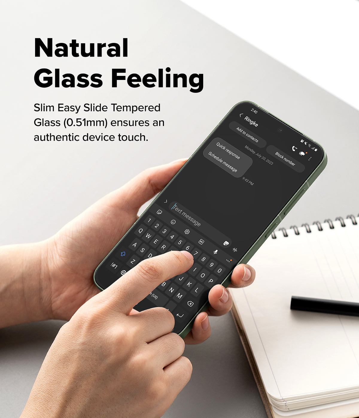 OnePlus 13S Screen Protector | Easy Slide Tempered Glass - Hands using a smartphone with a slim tempered glass screen protector and keyboard open.