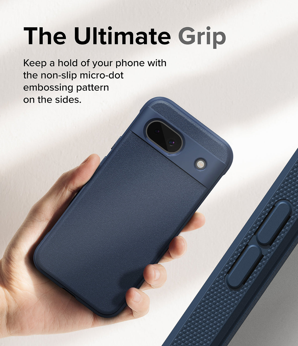 Google Pixel 8a Case | Onyx - A hand holding a dark blue phone case with a textured side grip and camera cutout.