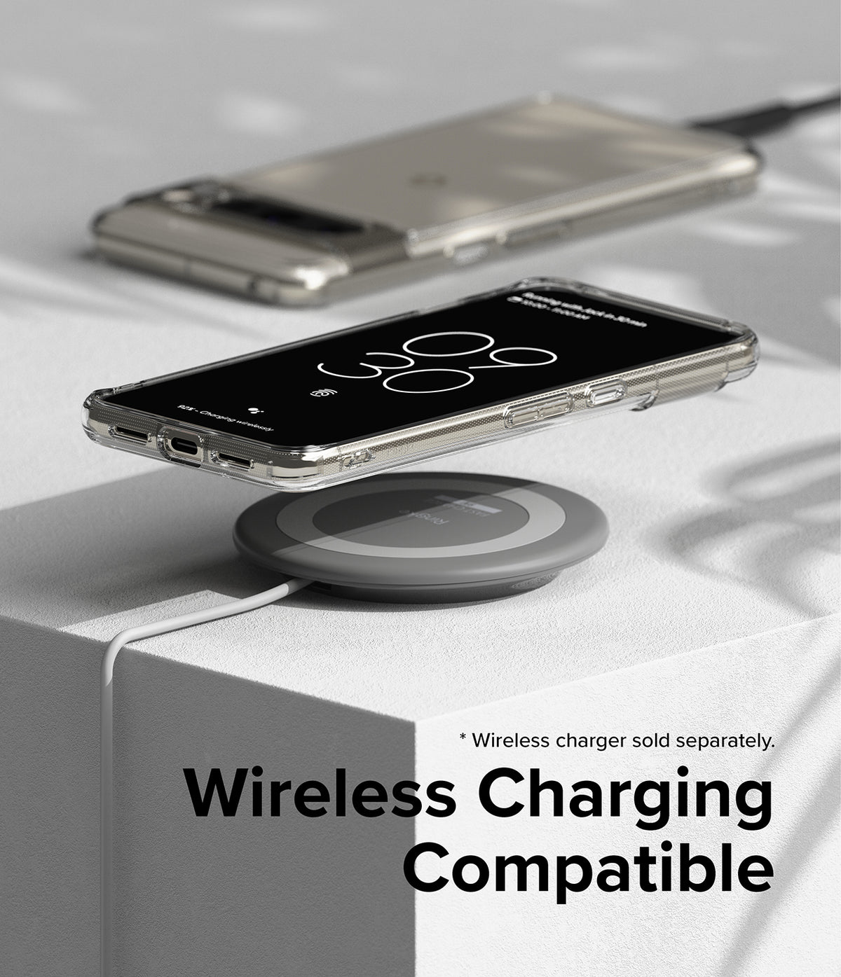 Google Pixel 8 Pro Case | Fusion - Clear phone case on a Google Pixel 8 Pro wirelessly charging on a grey pad.