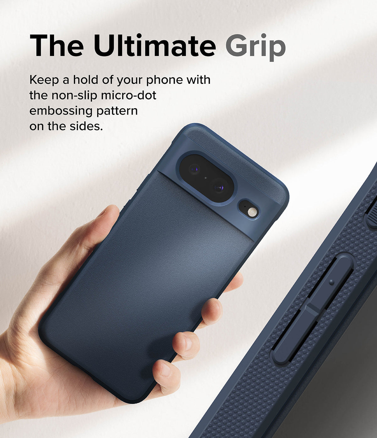 Google Pixel 8 Case | Onyx - Hand holding a dark blue phone case with a textured micro-dot side grip pattern.